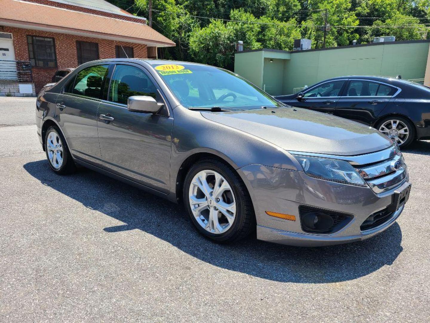 2012 GRAY FORD FUSION SE (3FAHP0HA0CR) with an 2.5L engine, Automatic transmission, located at 117 North Cameron Street, Harrisburg, PA, 17101, (717) 963-8962, 40.267021, -76.875351 - WE FINANCE!!! Good Credit/ Bad Credit/ No Credit - ALL Trade-Ins Welcomed!!! ***Guaranteed Credit Approval*** APPLY ONLINE or CALL us TODAY ;) Internet Prices and Marketplace Prices are SPECIAL discounted ***CASH DEALS*** Retail Prices are higher. Please call us to discuss your cash and finan - Photo#6