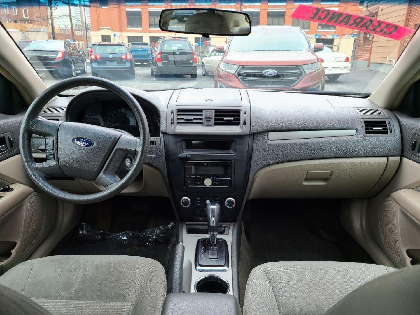 2012 WHITE FORD FUSION S (3FAHP0GA8CR) with an 2.5L engine, Automatic transmission, located at 117 North Cameron Street, Harrisburg, PA, 17101, (717) 963-8962, 40.267021, -76.875351 - Photo#10