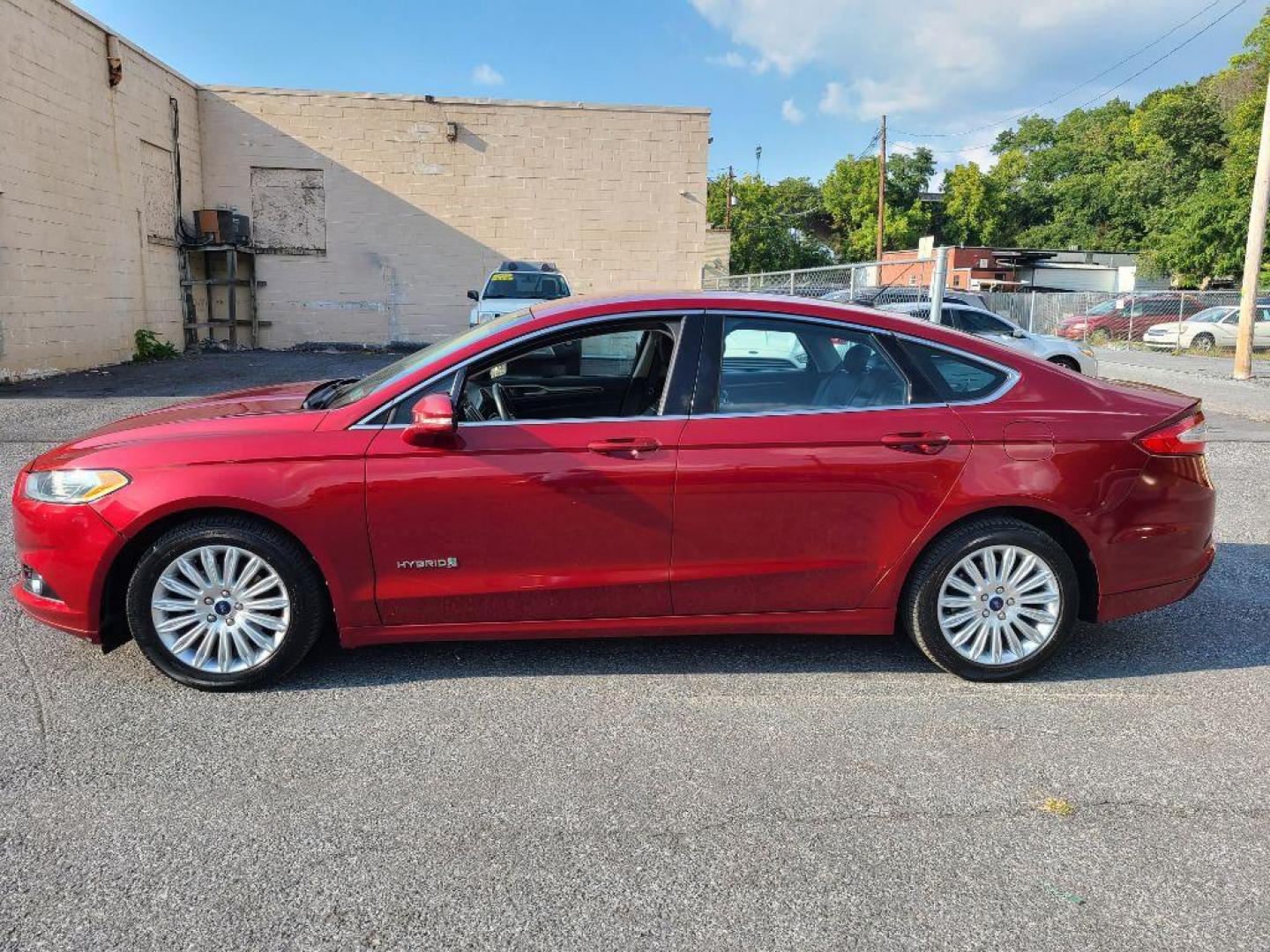 2013 RED FORD FUSION SE HYBRID (3FA6P0LU6DR) with an 2.0L engine, Continuously Variable transmission, located at 7981 Paxton Street, Harrisburg, PA, 17111, (717) 561-2926, 40.261490, -76.749229 - WE FINANCE!!! Good Credit/ Bad Credit/ No Credit - ALL Trade-Ins Welcomed!!! ***Guaranteed Credit Approval*** APPLY ONLINE or CALL us TODAY ;) Internet Prices and Marketplace Prices are SPECIAL discounted ***CASH DEALS*** Retail Prices are higher. Please call us to discuss your cash and finan - Photo#1