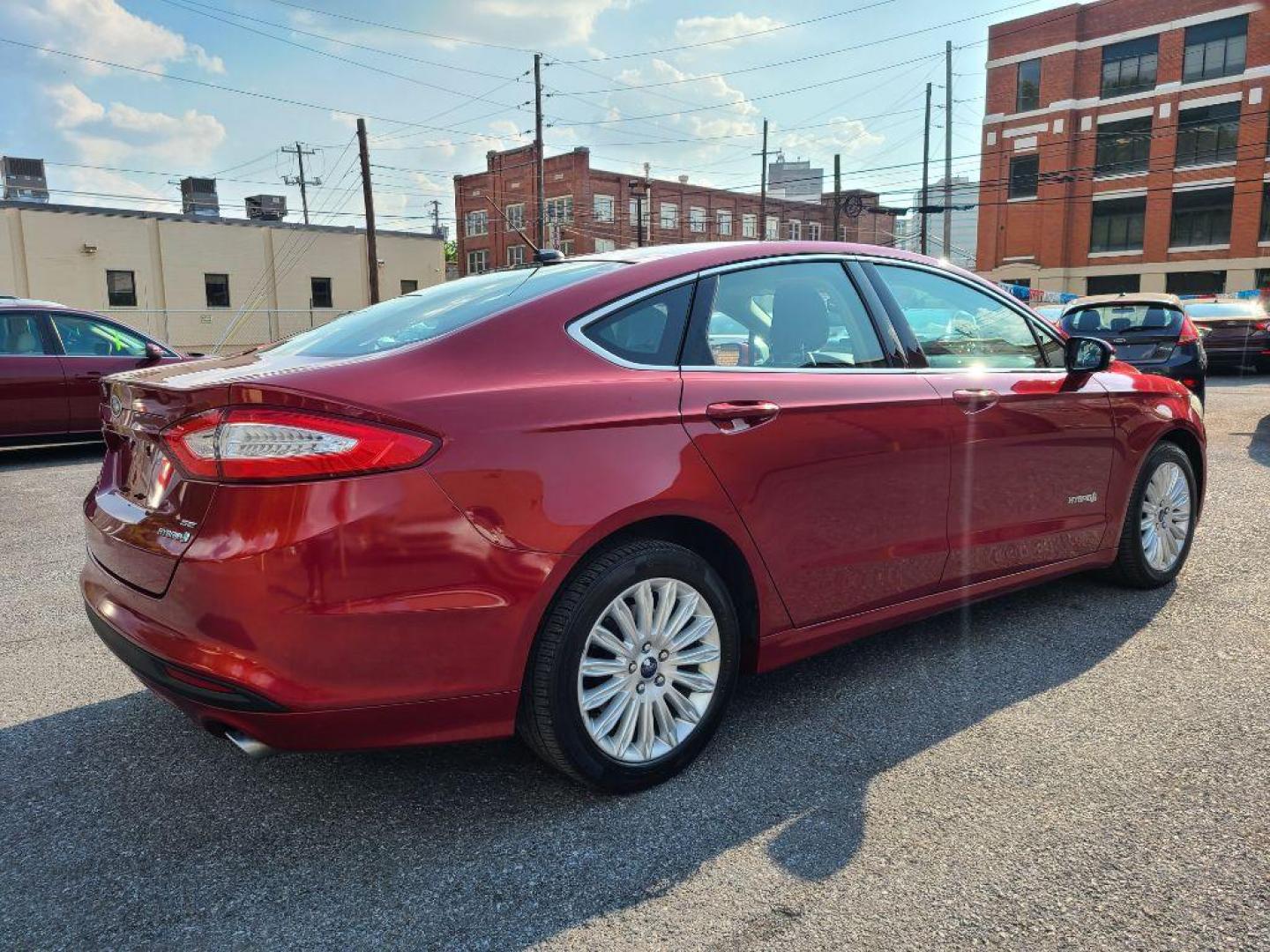 2013 RED FORD FUSION SE HYBRID (3FA6P0LU6DR) with an 2.0L engine, Continuously Variable transmission, located at 7981 Paxton Street, Harrisburg, PA, 17111, (717) 561-2926, 40.261490, -76.749229 - WE FINANCE!!! Good Credit/ Bad Credit/ No Credit - ALL Trade-Ins Welcomed!!! ***Guaranteed Credit Approval*** APPLY ONLINE or CALL us TODAY ;) Internet Prices and Marketplace Prices are SPECIAL discounted ***CASH DEALS*** Retail Prices are higher. Please call us to discuss your cash and finan - Photo#4