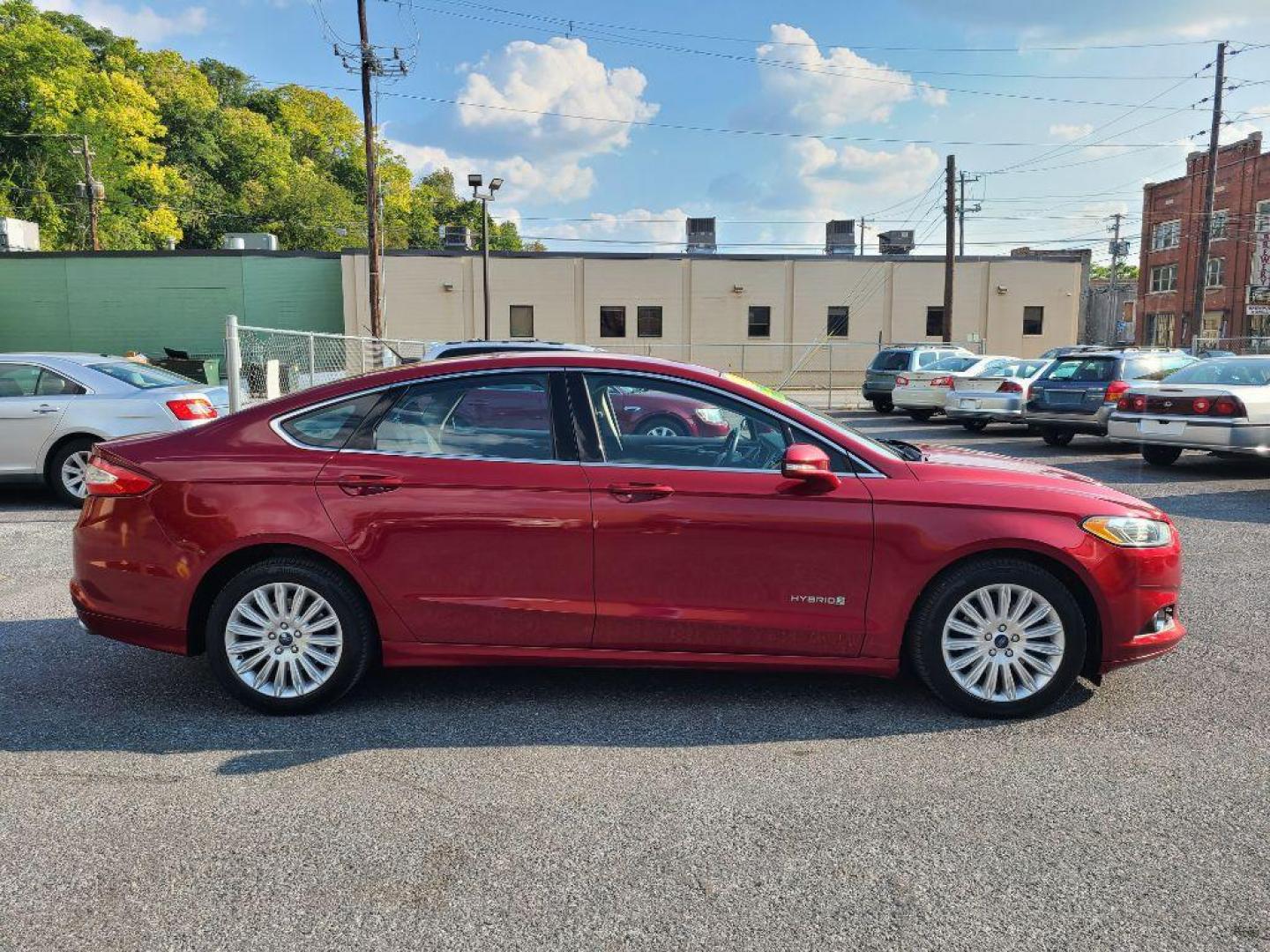 2013 RED FORD FUSION SE HYBRID (3FA6P0LU6DR) with an 2.0L engine, Continuously Variable transmission, located at 7981 Paxton Street, Harrisburg, PA, 17111, (717) 561-2926, 40.261490, -76.749229 - WE FINANCE!!! Good Credit/ Bad Credit/ No Credit - ALL Trade-Ins Welcomed!!! ***Guaranteed Credit Approval*** APPLY ONLINE or CALL us TODAY ;) Internet Prices and Marketplace Prices are SPECIAL discounted ***CASH DEALS*** Retail Prices are higher. Please call us to discuss your cash and finan - Photo#5