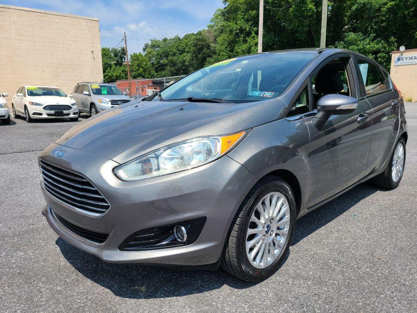 2014 GREY FORD FIESTA TITANIUM (3FADP4FJ9EM) with an 1.6L engine, Automatic transmission, located at 117 North Cameron Street, Harrisburg, PA, 17101, (717) 963-8962, 40.267021, -76.875351 - WE FINANCE!!! Good Credit/ Bad Credit/ No Credit - ALL Trade-Ins Welcomed!!! ***Guaranteed Credit Approval*** APPLY ONLINE or CALL us TODAY ;) Internet Prices and Marketplace Prices are SPECIAL discounted ***CASH DEALS*** Retail Prices are higher. Please call us to discuss your cash and finan - Photo#0