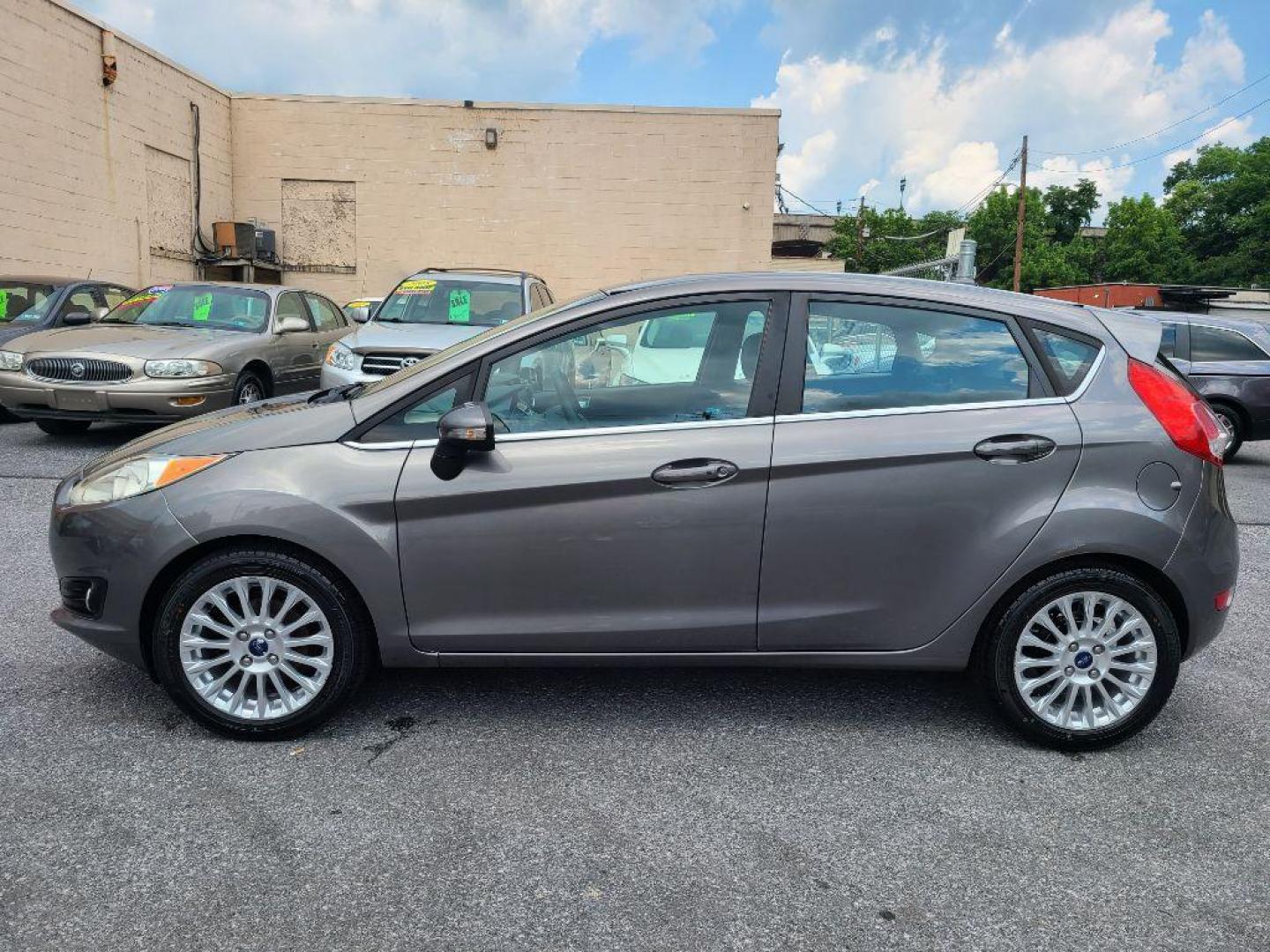 2014 GREY FORD FIESTA TITANIUM (3FADP4FJ9EM) with an 1.6L engine, Automatic transmission, located at 117 North Cameron Street, Harrisburg, PA, 17101, (717) 963-8962, 40.267021, -76.875351 - WE FINANCE!!! Good Credit/ Bad Credit/ No Credit - ALL Trade-Ins Welcomed!!! ***Guaranteed Credit Approval*** APPLY ONLINE or CALL us TODAY ;) Internet Prices and Marketplace Prices are SPECIAL discounted ***CASH DEALS*** Retail Prices are higher. Please call us to discuss your cash and finan - Photo#1