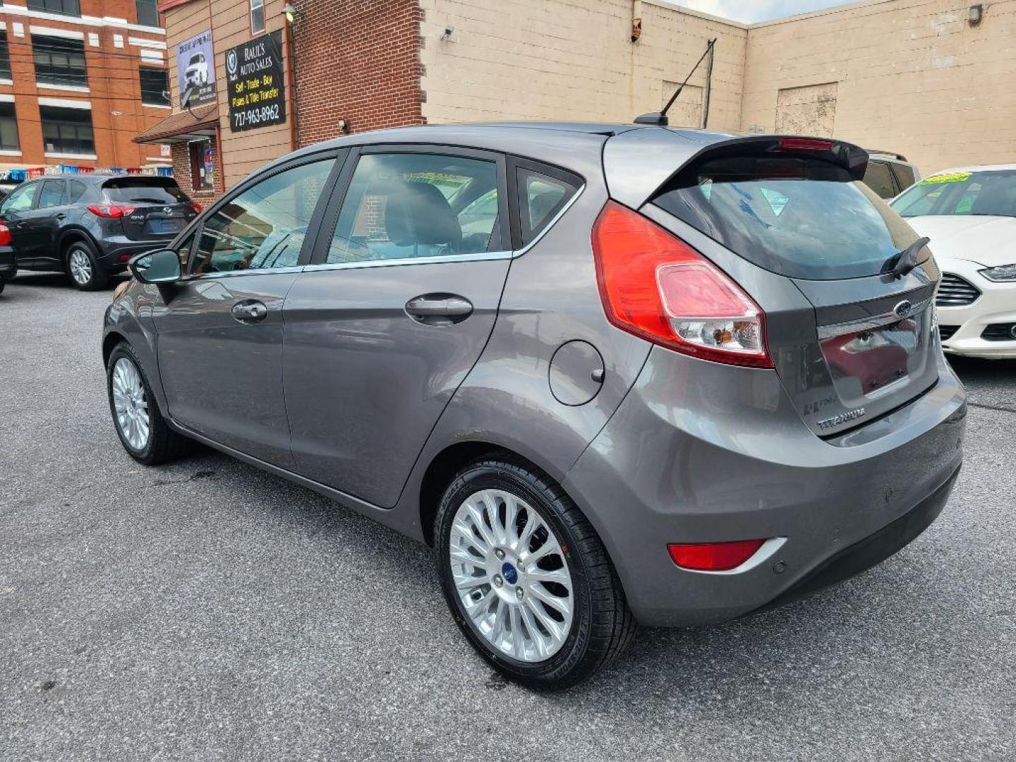 2014 GREY FORD FIESTA TITANIUM (3FADP4FJ9EM) with an 1.6L engine, Automatic transmission, located at 117 North Cameron Street, Harrisburg, PA, 17101, (717) 963-8962, 40.267021, -76.875351 - WE FINANCE!!! Good Credit/ Bad Credit/ No Credit - ALL Trade-Ins Welcomed!!! ***Guaranteed Credit Approval*** APPLY ONLINE or CALL us TODAY ;) Internet Prices and Marketplace Prices are SPECIAL discounted ***CASH DEALS*** Retail Prices are higher. Please call us to discuss your cash and finan - Photo#2