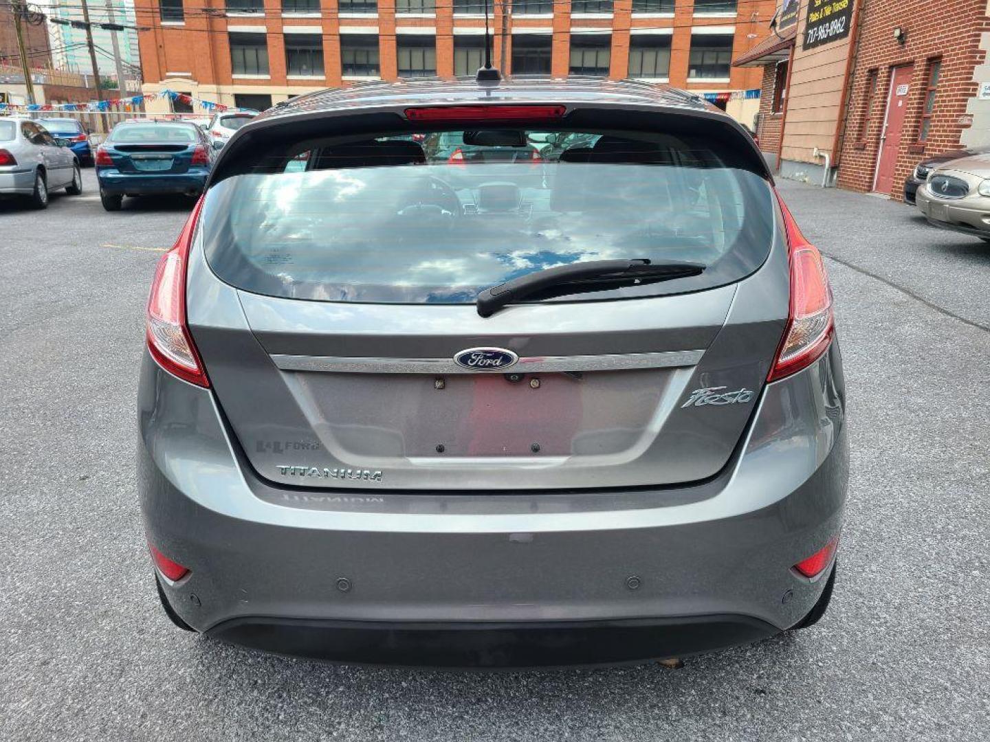 2014 GREY FORD FIESTA TITANIUM (3FADP4FJ9EM) with an 1.6L engine, Automatic transmission, located at 117 North Cameron Street, Harrisburg, PA, 17101, (717) 963-8962, 40.267021, -76.875351 - WE FINANCE!!! Good Credit/ Bad Credit/ No Credit - ALL Trade-Ins Welcomed!!! ***Guaranteed Credit Approval*** APPLY ONLINE or CALL us TODAY ;) Internet Prices and Marketplace Prices are SPECIAL discounted ***CASH DEALS*** Retail Prices are higher. Please call us to discuss your cash and finan - Photo#3