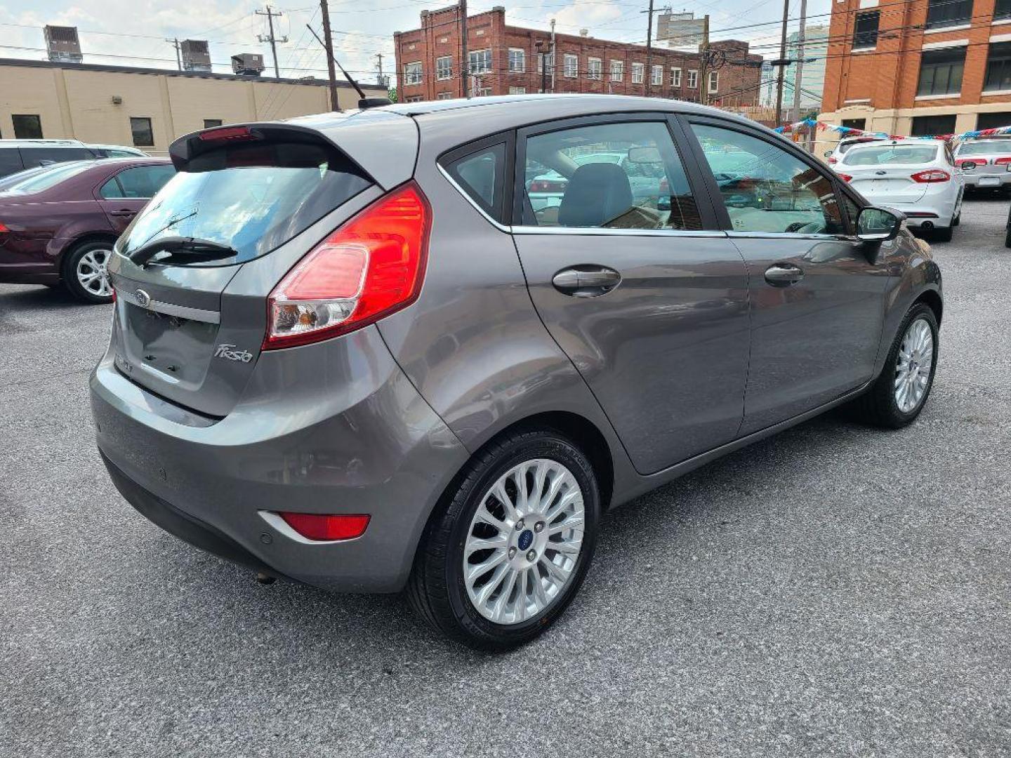 2014 GREY FORD FIESTA TITANIUM (3FADP4FJ9EM) with an 1.6L engine, Automatic transmission, located at 117 North Cameron Street, Harrisburg, PA, 17101, (717) 963-8962, 40.267021, -76.875351 - WE FINANCE!!! Good Credit/ Bad Credit/ No Credit - ALL Trade-Ins Welcomed!!! ***Guaranteed Credit Approval*** APPLY ONLINE or CALL us TODAY ;) Internet Prices and Marketplace Prices are SPECIAL discounted ***CASH DEALS*** Retail Prices are higher. Please call us to discuss your cash and finan - Photo#4