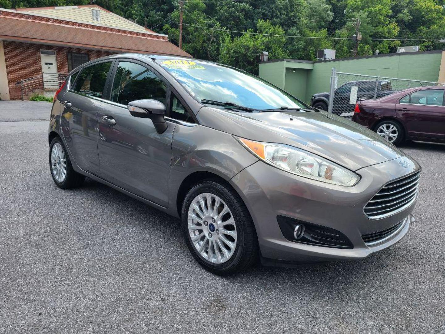 2014 GREY FORD FIESTA TITANIUM (3FADP4FJ9EM) with an 1.6L engine, Automatic transmission, located at 117 North Cameron Street, Harrisburg, PA, 17101, (717) 963-8962, 40.267021, -76.875351 - WE FINANCE!!! Good Credit/ Bad Credit/ No Credit - ALL Trade-Ins Welcomed!!! ***Guaranteed Credit Approval*** APPLY ONLINE or CALL us TODAY ;) Internet Prices and Marketplace Prices are SPECIAL discounted ***CASH DEALS*** Retail Prices are higher. Please call us to discuss your cash and finan - Photo#6