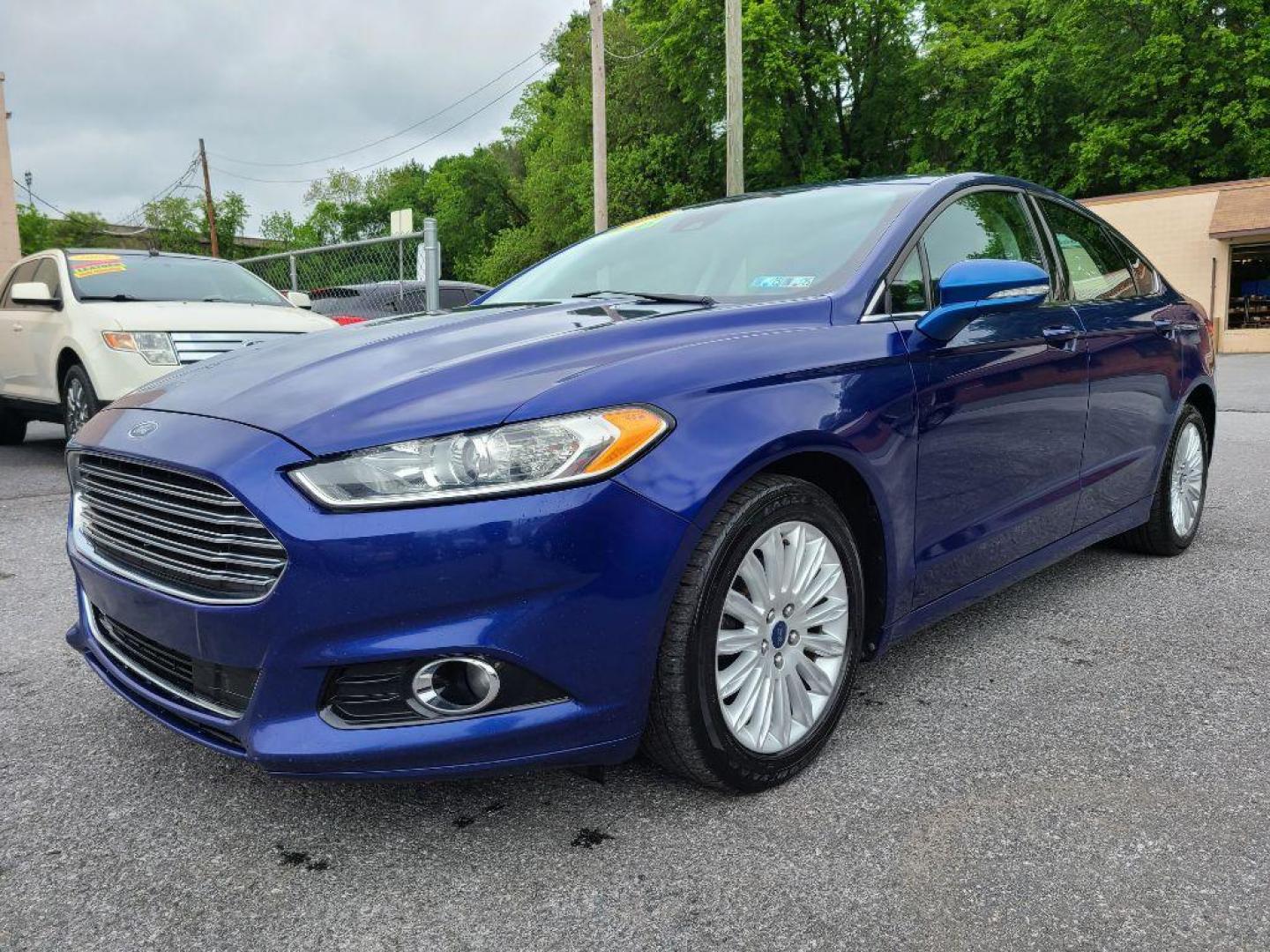 2014 BLUE FORD FUSION SE HYBRID (3FA6P0LU0ER) with an 2.0L engine, Continuously Variable transmission, located at 117 North Cameron Street, Harrisburg, PA, 17101, (717) 963-8962, 40.267021, -76.875351 - WE FINANCE!!! Good Credit/ Bad Credit/ No Credit - ALL Trade-Ins Welcomed!!! ***Guaranteed Credit Approval*** APPLY ONLINE or CALL us TODAY ;) Internet Prices and Marketplace Prices are SPECIAL discounted ***CASH DEALS*** Retail Prices are higher. Please call us to discuss your cash and finan - Photo#0