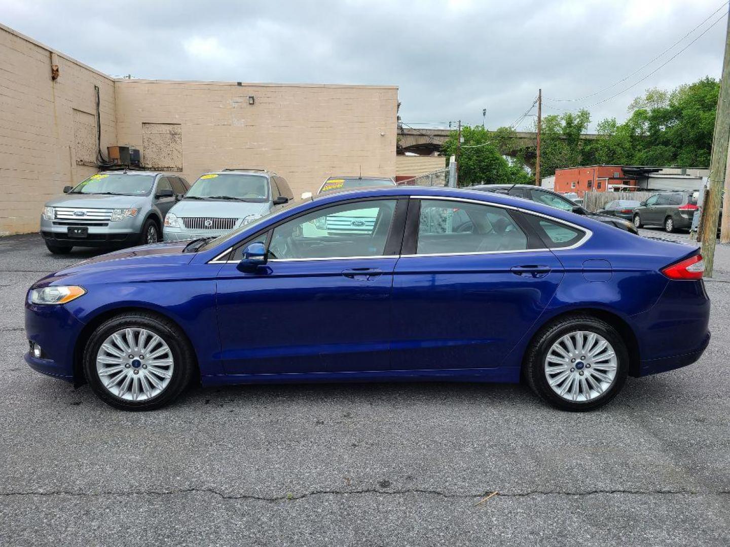 2014 BLUE FORD FUSION SE HYBRID (3FA6P0LU0ER) with an 2.0L engine, Continuously Variable transmission, located at 117 North Cameron Street, Harrisburg, PA, 17101, (717) 963-8962, 40.267021, -76.875351 - WE FINANCE!!! Good Credit/ Bad Credit/ No Credit - ALL Trade-Ins Welcomed!!! ***Guaranteed Credit Approval*** APPLY ONLINE or CALL us TODAY ;) Internet Prices and Marketplace Prices are SPECIAL discounted ***CASH DEALS*** Retail Prices are higher. Please call us to discuss your cash and finan - Photo#1