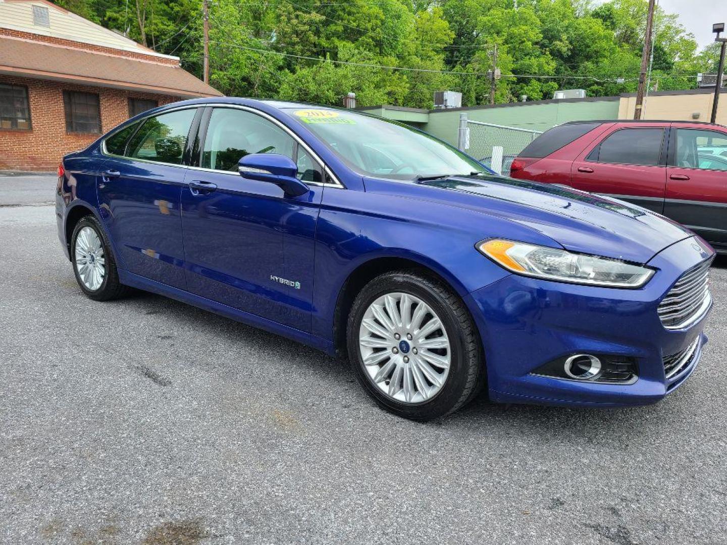 2014 BLUE FORD FUSION SE HYBRID (3FA6P0LU0ER) with an 2.0L engine, Continuously Variable transmission, located at 117 North Cameron Street, Harrisburg, PA, 17101, (717) 963-8962, 40.267021, -76.875351 - WE FINANCE!!! Good Credit/ Bad Credit/ No Credit - ALL Trade-Ins Welcomed!!! ***Guaranteed Credit Approval*** APPLY ONLINE or CALL us TODAY ;) Internet Prices and Marketplace Prices are SPECIAL discounted ***CASH DEALS*** Retail Prices are higher. Please call us to discuss your cash and finan - Photo#6