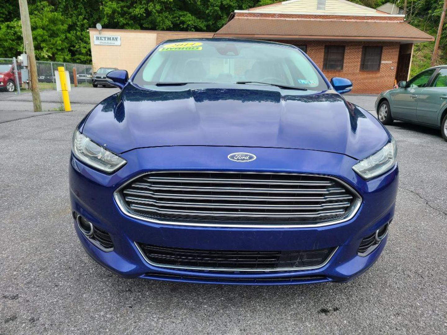 2014 BLUE FORD FUSION SE HYBRID (3FA6P0LU0ER) with an 2.0L engine, Continuously Variable transmission, located at 117 North Cameron Street, Harrisburg, PA, 17101, (717) 963-8962, 40.267021, -76.875351 - WE FINANCE!!! Good Credit/ Bad Credit/ No Credit - ALL Trade-Ins Welcomed!!! ***Guaranteed Credit Approval*** APPLY ONLINE or CALL us TODAY ;) Internet Prices and Marketplace Prices are SPECIAL discounted ***CASH DEALS*** Retail Prices are higher. Please call us to discuss your cash and finan - Photo#7