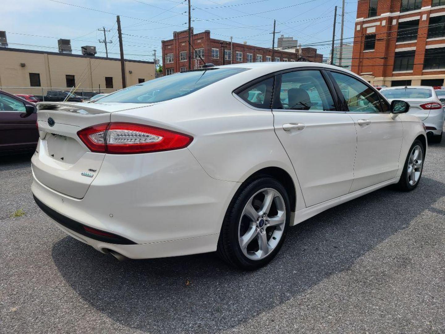 2014 WHITE FORD FUSION SE (1FA6P0HD4E5) with an 1.5L engine, Automatic transmission, located at 7981 Paxton Street, Harrisburg, PA, 17111, (717) 561-2926, 40.261490, -76.749229 - WE FINANCE!!! Good Credit/ Bad Credit/ No Credit - ALL Trade-Ins Welcomed!!! ***Guaranteed Credit Approval*** APPLY ONLINE or CALL us TODAY ;) Internet Prices and Marketplace Prices are SPECIAL discounted ***CASH DEALS*** Retail Prices are higher. Please call us to discuss your cash and finan - Photo#4