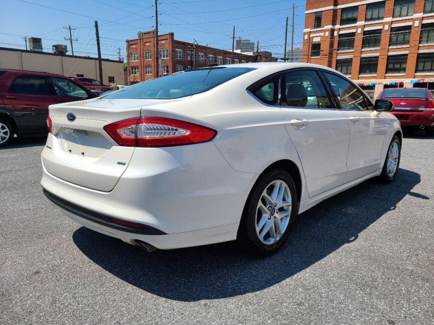 2014 WHITE FORD FUSION SE (1FA6P0H75E5) with an 2.5L engine, Automatic transmission, located at 7981 Paxton Street, Harrisburg, PA, 17111, (717) 561-2926, 40.261490, -76.749229 - Photo#4