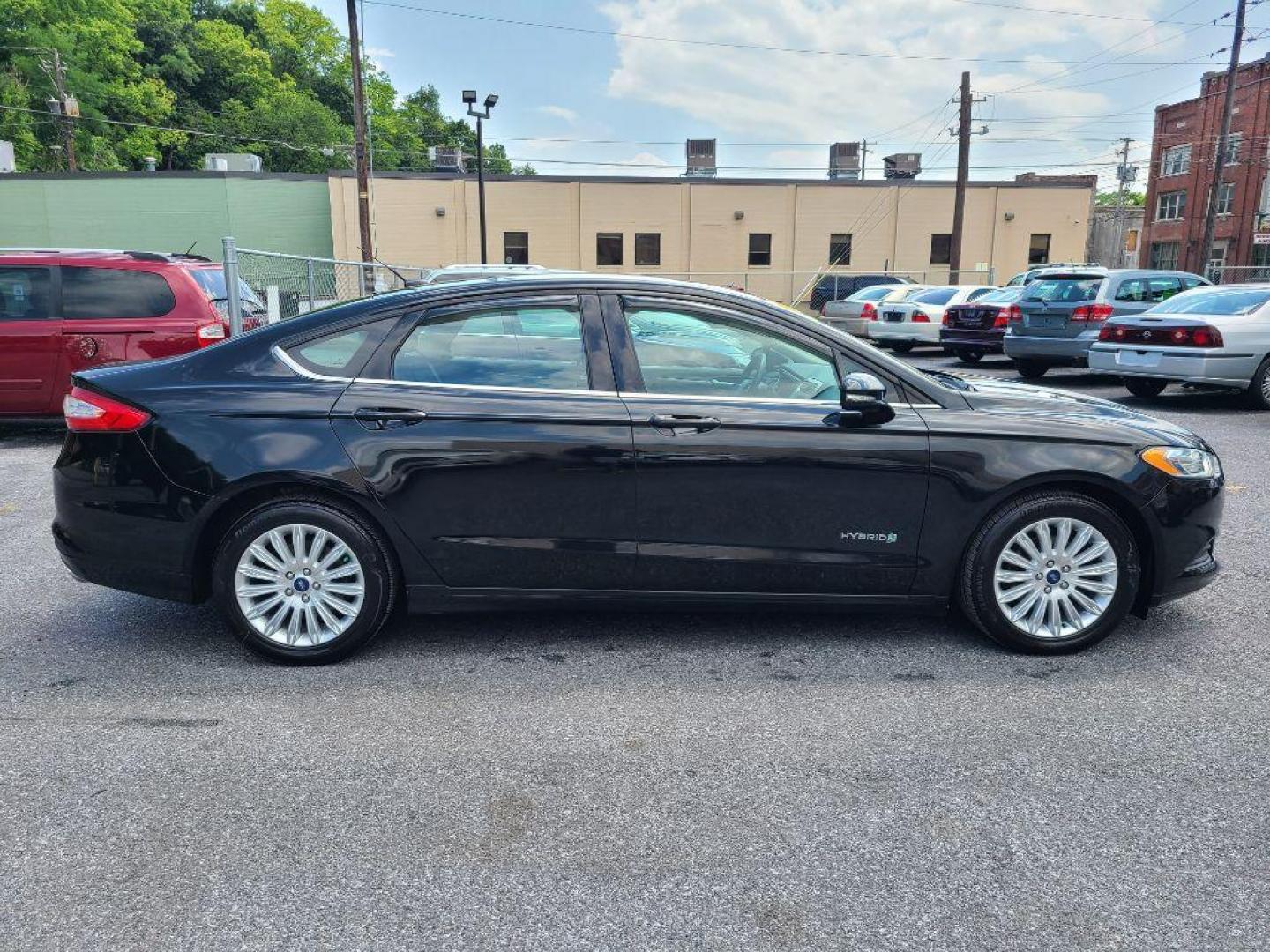 2014 BLACK FORD FUSION SE HYBRID (3FA6P0LU1ER) with an 2.0L engine, Continuously Variable transmission, located at 7981 Paxton Street, Harrisburg, PA, 17111, (717) 561-2926, 40.261490, -76.749229 - WE FINANCE!!! Good Credit/ Bad Credit/ No Credit - ALL Trade-Ins Welcomed!!! ***Guaranteed Credit Approval*** APPLY ONLINE or CALL us TODAY ;) Internet Prices and Marketplace Prices are SPECIAL discounted ***CASH DEALS*** Retail Prices are higher. Please call us to discuss your cash and finan - Photo#5