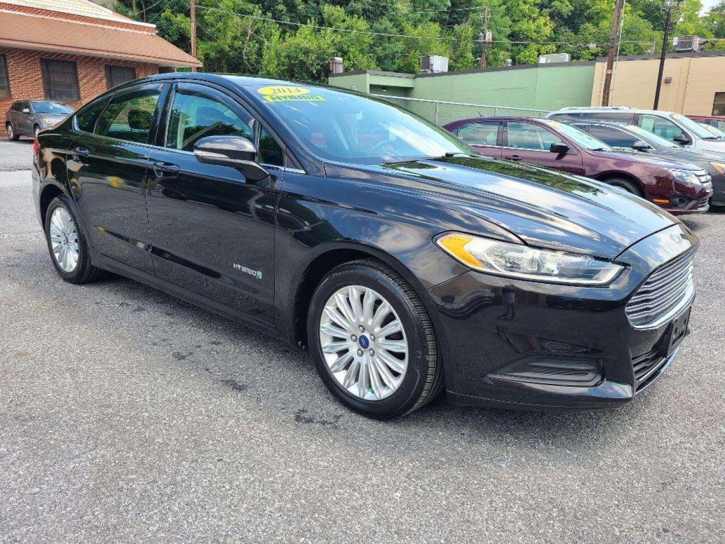 2014 BLACK FORD FUSION SE HYBRID (3FA6P0LU1ER) with an 2.0L engine, Continuously Variable transmission, located at 7981 Paxton Street, Harrisburg, PA, 17111, (717) 561-2926, 40.261490, -76.749229 - WE FINANCE!!! Good Credit/ Bad Credit/ No Credit - ALL Trade-Ins Welcomed!!! ***Guaranteed Credit Approval*** APPLY ONLINE or CALL us TODAY ;) Internet Prices and Marketplace Prices are SPECIAL discounted ***CASH DEALS*** Retail Prices are higher. Please call us to discuss your cash and finan - Photo#6