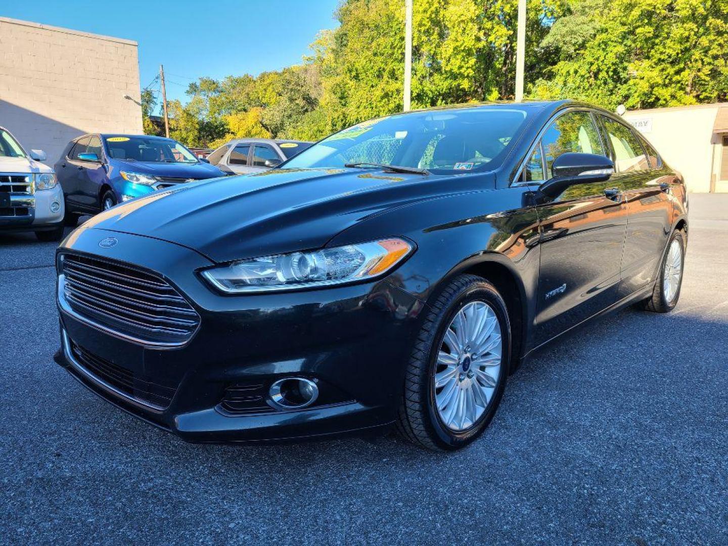 2014 GRAY FORD FUSION SE HYBRID (3FA6P0LU3ER) with an 2.0L engine, Continuously Variable transmission, located at 117 North Cameron Street, Harrisburg, PA, 17101, (717) 963-8962, 40.267021, -76.875351 - WE FINANCE!!! Good Credit/ Bad Credit/ No Credit - ALL Trade-Ins Welcomed!!! ***Guaranteed Credit Approval*** APPLY ONLINE or CALL us TODAY ;) Internet Prices and Marketplace Prices are SPECIAL discounted ***CASH DEALS*** Retail Prices are higher. Please call us to discuss your cash and finan - Photo#0