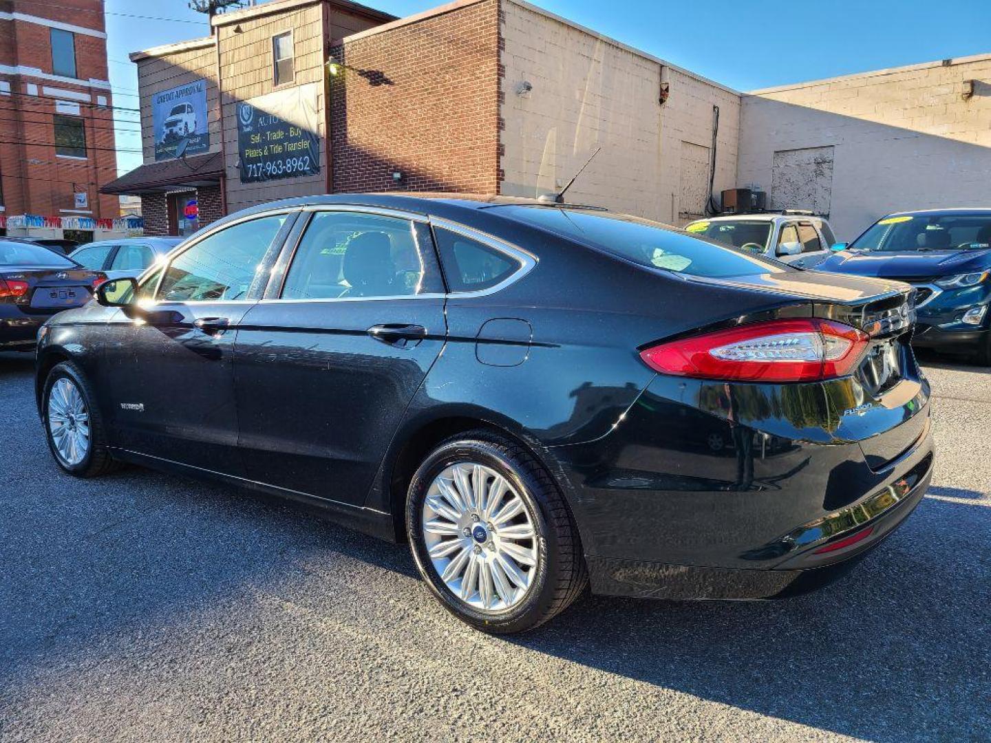 2014 GRAY FORD FUSION SE HYBRID (3FA6P0LU3ER) with an 2.0L engine, Continuously Variable transmission, located at 117 North Cameron Street, Harrisburg, PA, 17101, (717) 963-8962, 40.267021, -76.875351 - WE FINANCE!!! Good Credit/ Bad Credit/ No Credit - ALL Trade-Ins Welcomed!!! ***Guaranteed Credit Approval*** APPLY ONLINE or CALL us TODAY ;) Internet Prices and Marketplace Prices are SPECIAL discounted ***CASH DEALS*** Retail Prices are higher. Please call us to discuss your cash and finan - Photo#2