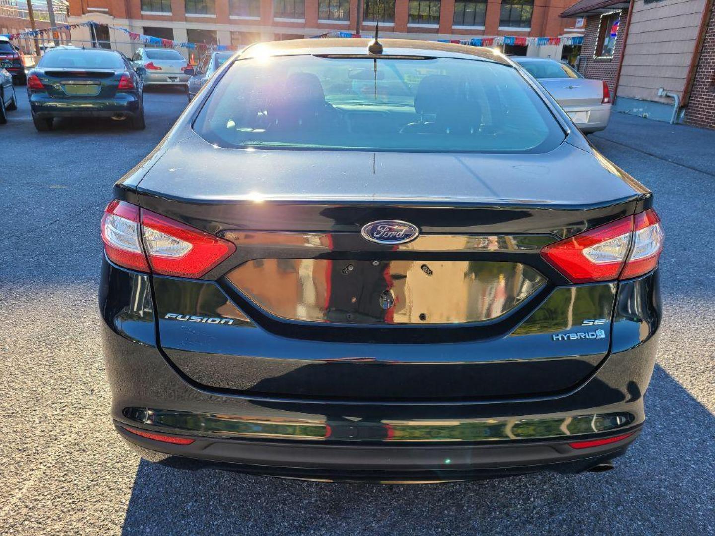 2014 GRAY FORD FUSION SE HYBRID (3FA6P0LU3ER) with an 2.0L engine, Continuously Variable transmission, located at 117 North Cameron Street, Harrisburg, PA, 17101, (717) 963-8962, 40.267021, -76.875351 - WE FINANCE!!! Good Credit/ Bad Credit/ No Credit - ALL Trade-Ins Welcomed!!! ***Guaranteed Credit Approval*** APPLY ONLINE or CALL us TODAY ;) Internet Prices and Marketplace Prices are SPECIAL discounted ***CASH DEALS*** Retail Prices are higher. Please call us to discuss your cash and finan - Photo#3