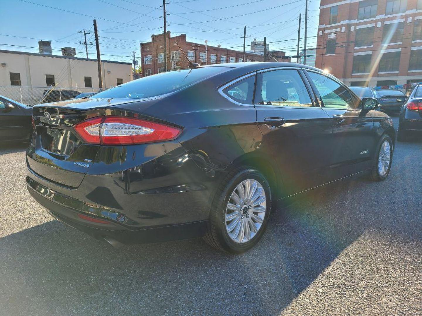 2014 GRAY FORD FUSION SE HYBRID (3FA6P0LU3ER) with an 2.0L engine, Continuously Variable transmission, located at 117 North Cameron Street, Harrisburg, PA, 17101, (717) 963-8962, 40.267021, -76.875351 - WE FINANCE!!! Good Credit/ Bad Credit/ No Credit - ALL Trade-Ins Welcomed!!! ***Guaranteed Credit Approval*** APPLY ONLINE or CALL us TODAY ;) Internet Prices and Marketplace Prices are SPECIAL discounted ***CASH DEALS*** Retail Prices are higher. Please call us to discuss your cash and finan - Photo#4