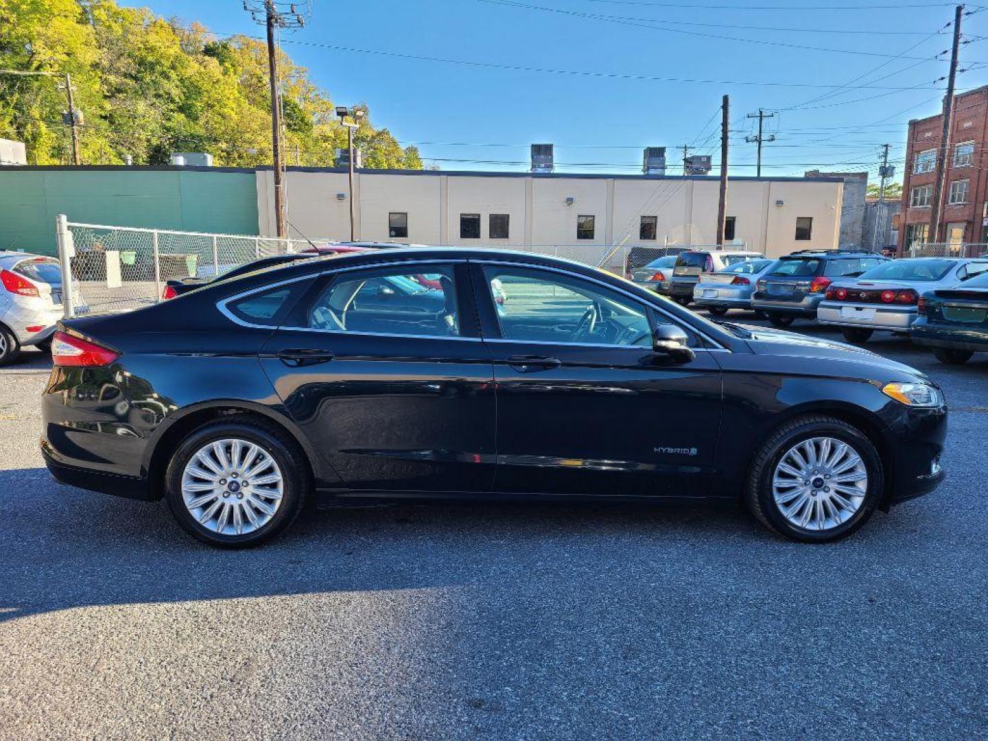 2014 GRAY FORD FUSION SE HYBRID (3FA6P0LU3ER) with an 2.0L engine, Continuously Variable transmission, located at 117 North Cameron Street, Harrisburg, PA, 17101, (717) 963-8962, 40.267021, -76.875351 - WE FINANCE!!! Good Credit/ Bad Credit/ No Credit - ALL Trade-Ins Welcomed!!! ***Guaranteed Credit Approval*** APPLY ONLINE or CALL us TODAY ;) Internet Prices and Marketplace Prices are SPECIAL discounted ***CASH DEALS*** Retail Prices are higher. Please call us to discuss your cash and finan - Photo#5