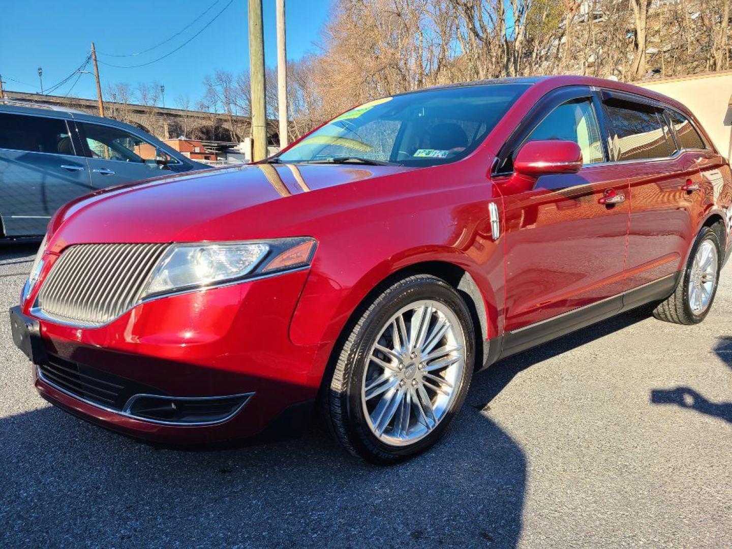 2014 RED LINCOLN MKT TILITY SUV AWD (2LMHJ5AT4EB) with an 3.5L engine, Automatic transmission, located at 7981 Paxton Street, Harrisburg, PA, 17111, (717) 561-2926, 40.261490, -76.749229 - WE FINANCE!!! Good Credit/ Bad Credit/ No Credit - ALL Trade-Ins Welcomed!!! ***Guaranteed Credit Approval*** APPLY ONLINE or CALL us TODAY ;) Internet Prices and Marketplace Prices are SPECIAL discounted ***CASH DEALS*** Retail Prices are higher. Please call us to discuss your cash and finan - Photo#0