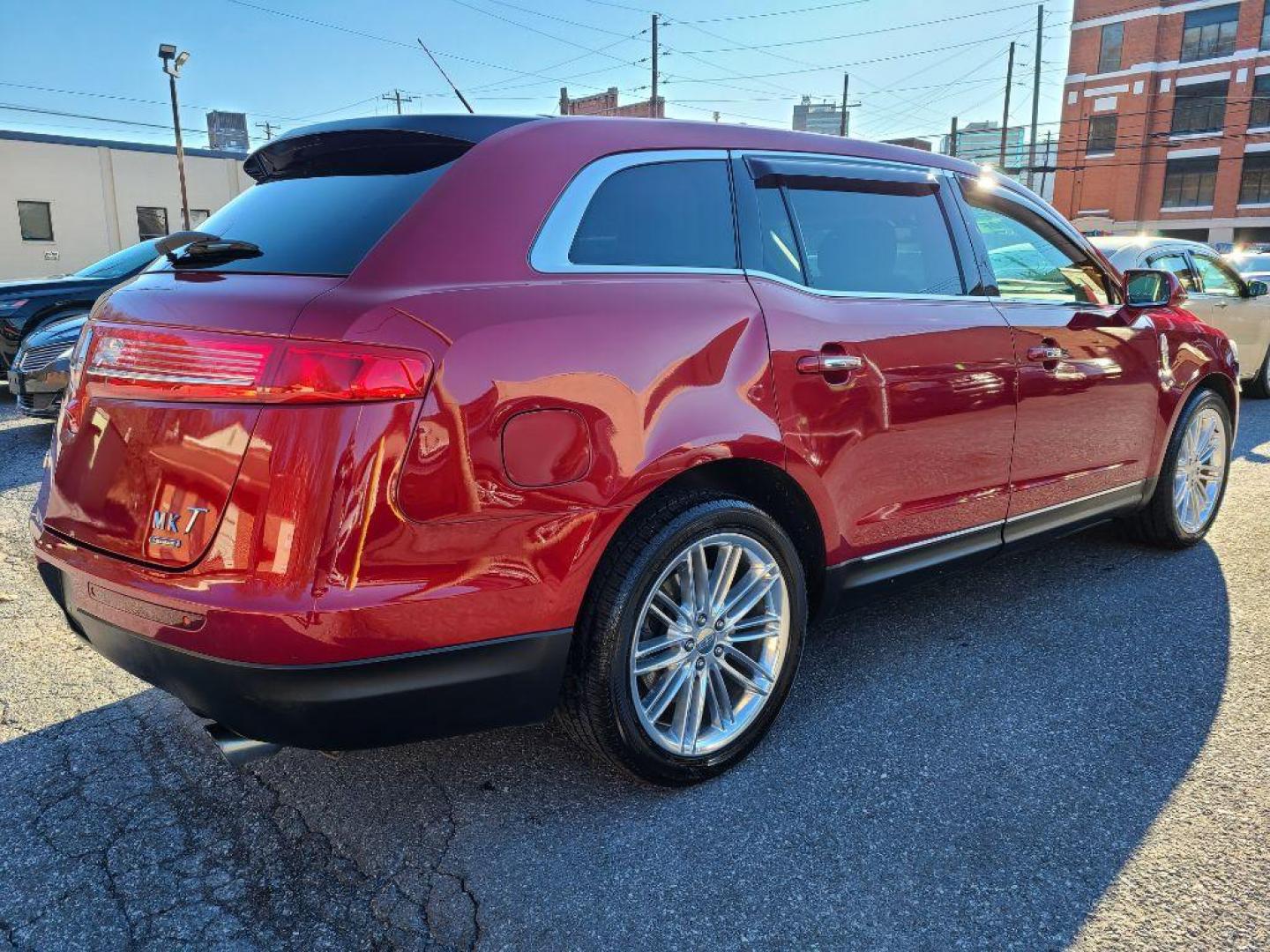 2014 RED LINCOLN MKT TILITY SUV AWD (2LMHJ5AT4EB) with an 3.5L engine, Automatic transmission, located at 7981 Paxton Street, Harrisburg, PA, 17111, (717) 561-2926, 40.261490, -76.749229 - WE FINANCE!!! Good Credit/ Bad Credit/ No Credit - ALL Trade-Ins Welcomed!!! ***Guaranteed Credit Approval*** APPLY ONLINE or CALL us TODAY ;) Internet Prices and Marketplace Prices are SPECIAL discounted ***CASH DEALS*** Retail Prices are higher. Please call us to discuss your cash and finan - Photo#4