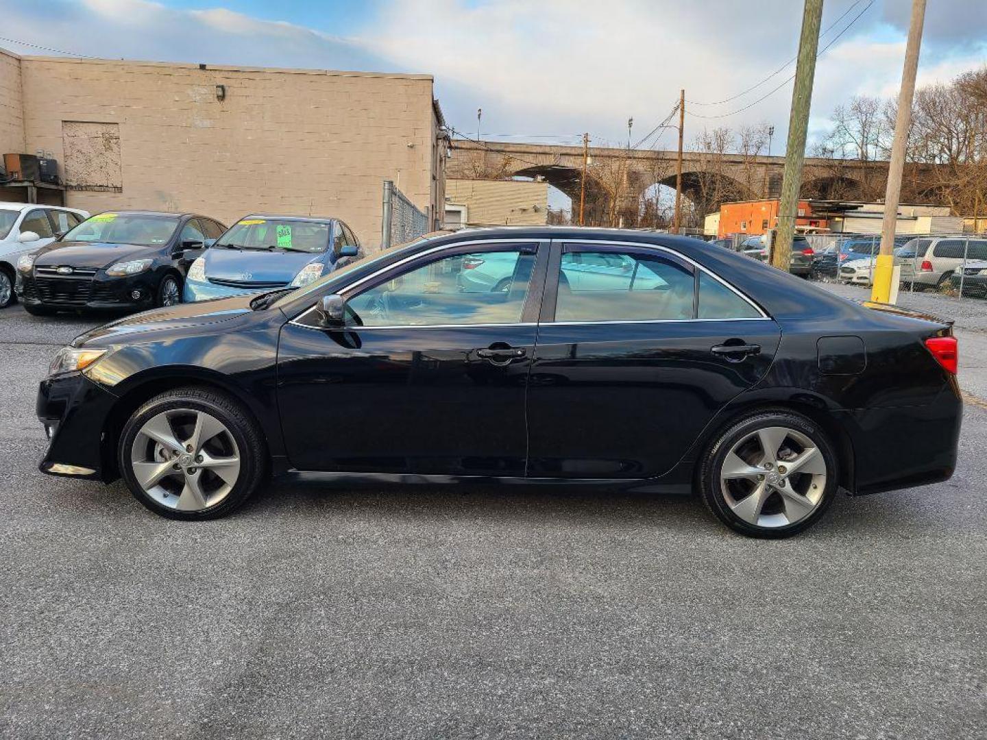 2014 BLACK TOYOTA CAMRY SE (4T1BF1FK5EU) with an 2.5L engine, Automatic transmission, located at 7981 Paxton Street, Harrisburg, PA, 17111, (717) 561-2926, 40.261490, -76.749229 - WE FINANCE!!! Good Credit/ Bad Credit/ No Credit - ALL Trade-Ins Welcomed!!! ***Guaranteed Credit Approval*** APPLY ONLINE or CALL us TODAY ;) Internet Prices and Marketplace Prices are SPECIAL discounted ***CASH DEALS*** Retail Prices are higher. Please call us to discuss your cash and finan - Photo#1