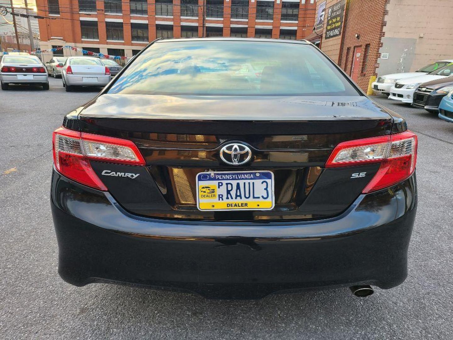 2014 BLACK TOYOTA CAMRY SE (4T1BF1FK5EU) with an 2.5L engine, Automatic transmission, located at 7981 Paxton Street, Harrisburg, PA, 17111, (717) 561-2926, 40.261490, -76.749229 - WE FINANCE!!! Good Credit/ Bad Credit/ No Credit - ALL Trade-Ins Welcomed!!! ***Guaranteed Credit Approval*** APPLY ONLINE or CALL us TODAY ;) Internet Prices and Marketplace Prices are SPECIAL discounted ***CASH DEALS*** Retail Prices are higher. Please call us to discuss your cash and finan - Photo#3