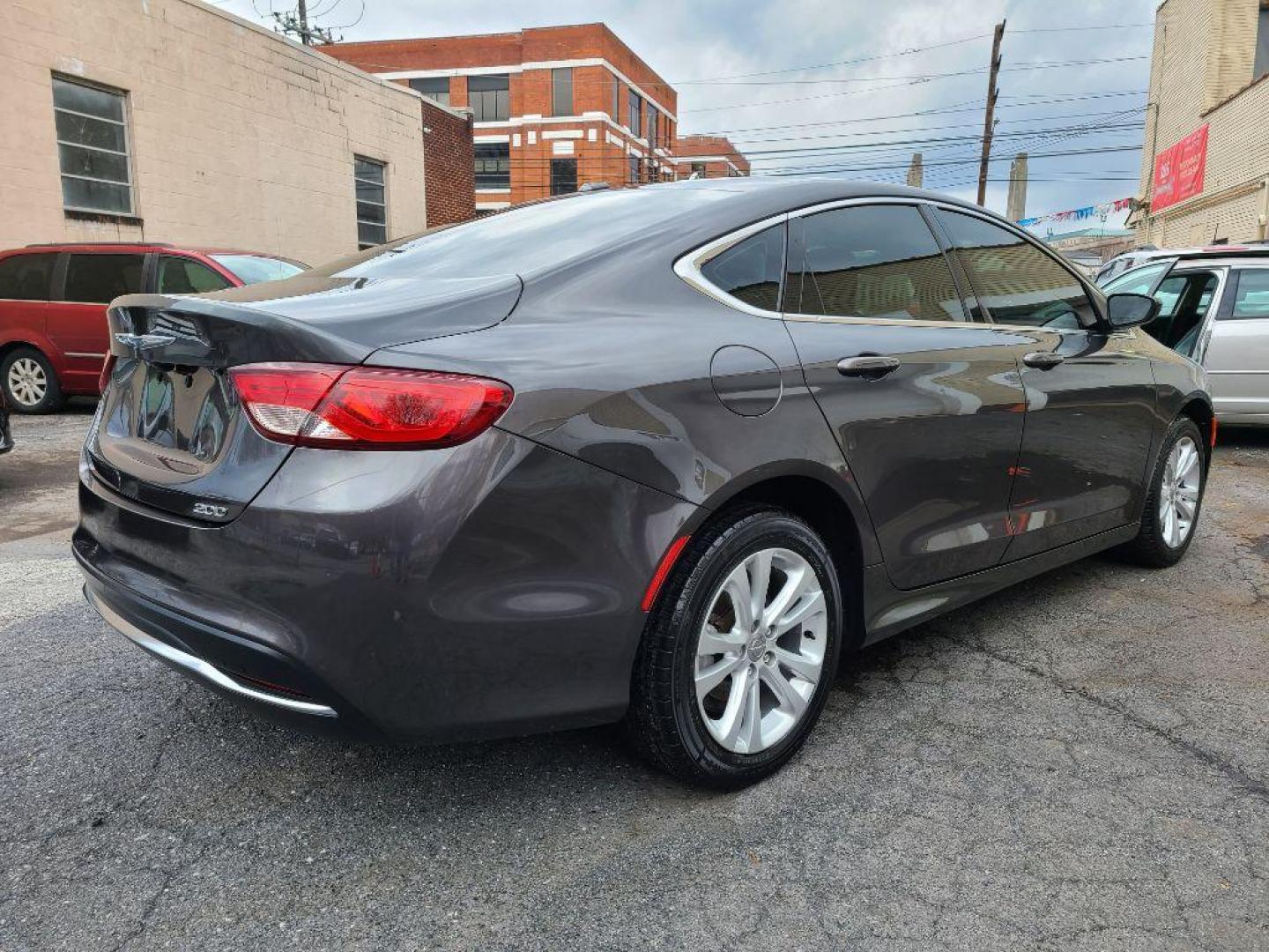 2015 GRAY CHRYSLER 200 LIMITED (1C3CCCAB5FN) with an 2.4L engine, Automatic transmission, located at 117 North Cameron Street, Harrisburg, PA, 17101, (717) 963-8962, 40.267021, -76.875351 - WE FINANCE!!! Good Credit/ Bad Credit/ No Credit - ALL Trade-Ins Welcomed!!! ***Guaranteed Credit Approval*** APPLY ONLINE or CALL us TODAY ;) Internet Prices and Marketplace Prices are SPECIAL discounted ***CASH DEALS*** Retail Prices are higher. Please call us to discuss your cash and finan - Photo#4