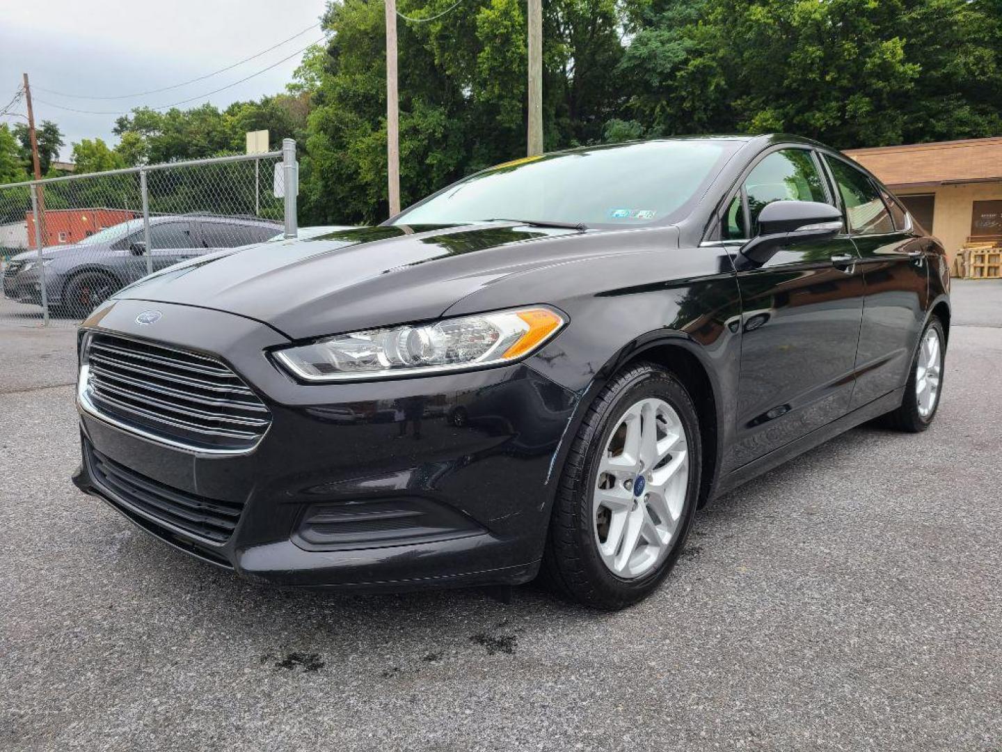 2015 BLACK FORD FUSION SE (3FA6P0H70FR) with an 2.5L engine, Automatic transmission, located at 7981 Paxton Street, Harrisburg, PA, 17111, (717) 561-2926, 40.261490, -76.749229 - WE FINANCE!!! Good Credit/ Bad Credit/ No Credit - ALL Trade-Ins Welcomed!!! ***Guaranteed Credit Approval*** APPLY ONLINE or CALL us TODAY ;) Internet Prices and Marketplace Prices are SPECIAL discounted ***CASH DEALS*** Retail Prices are higher. Please call us to discuss your cash and finan - Photo#0