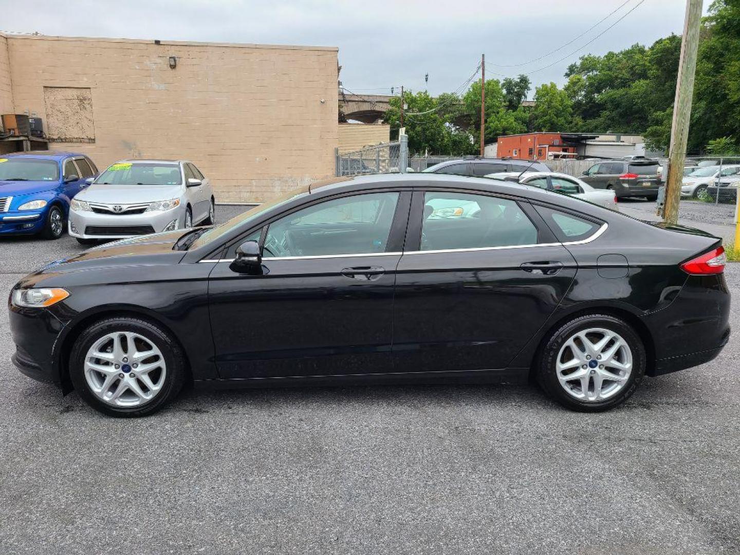 2015 BLACK FORD FUSION SE (3FA6P0H70FR) with an 2.5L engine, Automatic transmission, located at 7981 Paxton Street, Harrisburg, PA, 17111, (717) 561-2926, 40.261490, -76.749229 - WE FINANCE!!! Good Credit/ Bad Credit/ No Credit - ALL Trade-Ins Welcomed!!! ***Guaranteed Credit Approval*** APPLY ONLINE or CALL us TODAY ;) Internet Prices and Marketplace Prices are SPECIAL discounted ***CASH DEALS*** Retail Prices are higher. Please call us to discuss your cash and finan - Photo#1