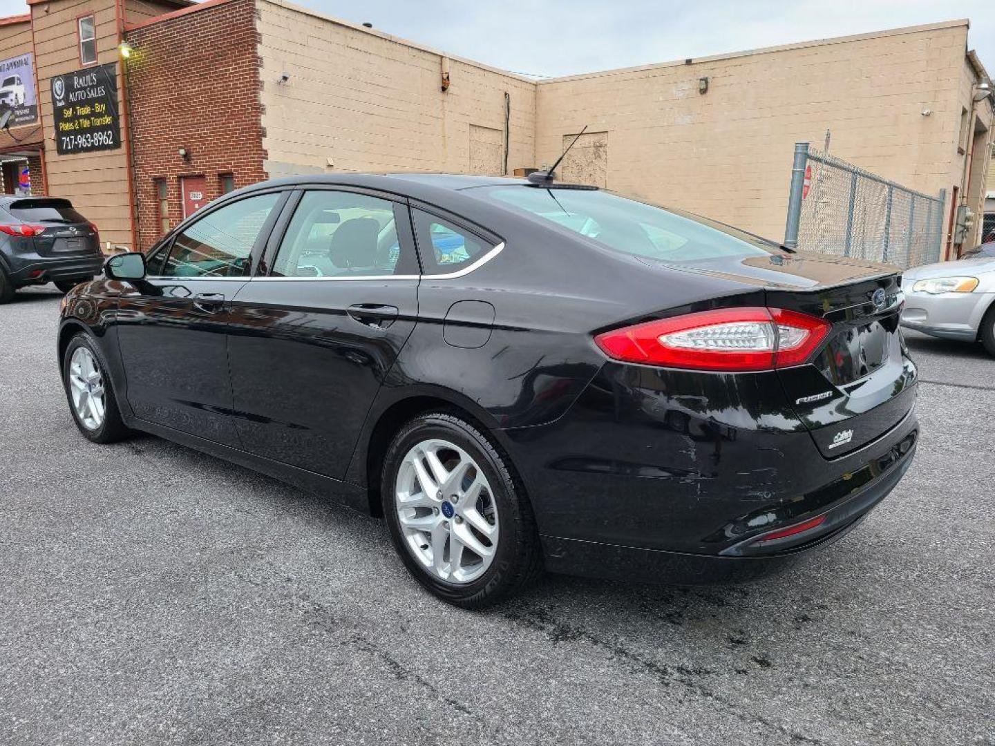 2015 BLACK FORD FUSION SE (3FA6P0H70FR) with an 2.5L engine, Automatic transmission, located at 7981 Paxton Street, Harrisburg, PA, 17111, (717) 561-2926, 40.261490, -76.749229 - WE FINANCE!!! Good Credit/ Bad Credit/ No Credit - ALL Trade-Ins Welcomed!!! ***Guaranteed Credit Approval*** APPLY ONLINE or CALL us TODAY ;) Internet Prices and Marketplace Prices are SPECIAL discounted ***CASH DEALS*** Retail Prices are higher. Please call us to discuss your cash and finan - Photo#2