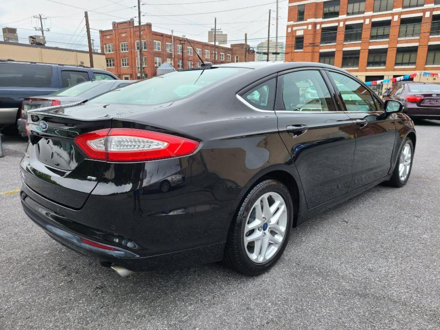 2015 BLACK FORD FUSION SE (3FA6P0H70FR) with an 2.5L engine, Automatic transmission, located at 7981 Paxton Street, Harrisburg, PA, 17111, (717) 561-2926, 40.261490, -76.749229 - WE FINANCE!!! Good Credit/ Bad Credit/ No Credit - ALL Trade-Ins Welcomed!!! ***Guaranteed Credit Approval*** APPLY ONLINE or CALL us TODAY ;) Internet Prices and Marketplace Prices are SPECIAL discounted ***CASH DEALS*** Retail Prices are higher. Please call us to discuss your cash and finan - Photo#4