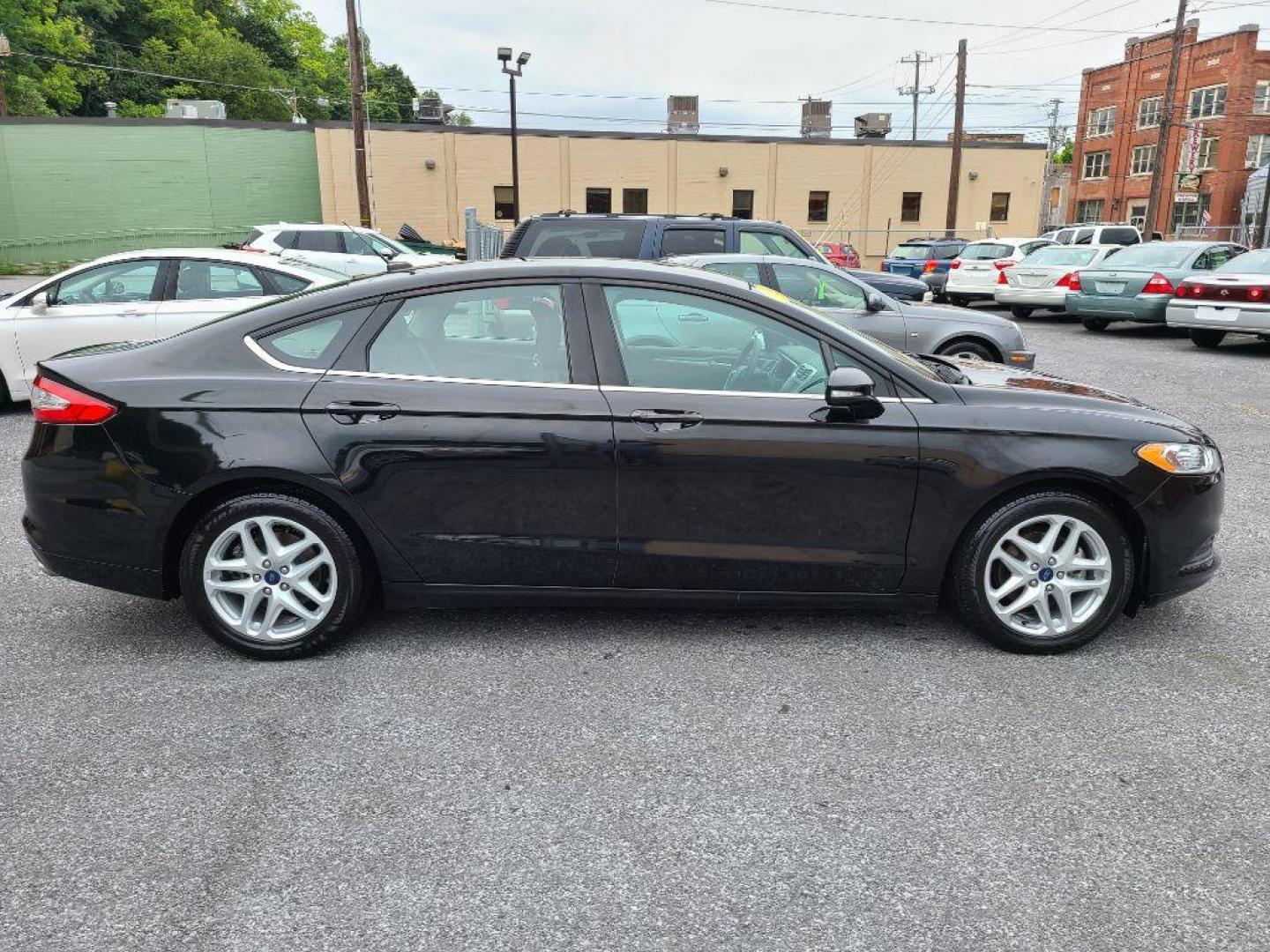 2015 BLACK FORD FUSION SE (3FA6P0H70FR) with an 2.5L engine, Automatic transmission, located at 7981 Paxton Street, Harrisburg, PA, 17111, (717) 561-2926, 40.261490, -76.749229 - WE FINANCE!!! Good Credit/ Bad Credit/ No Credit - ALL Trade-Ins Welcomed!!! ***Guaranteed Credit Approval*** APPLY ONLINE or CALL us TODAY ;) Internet Prices and Marketplace Prices are SPECIAL discounted ***CASH DEALS*** Retail Prices are higher. Please call us to discuss your cash and finan - Photo#5