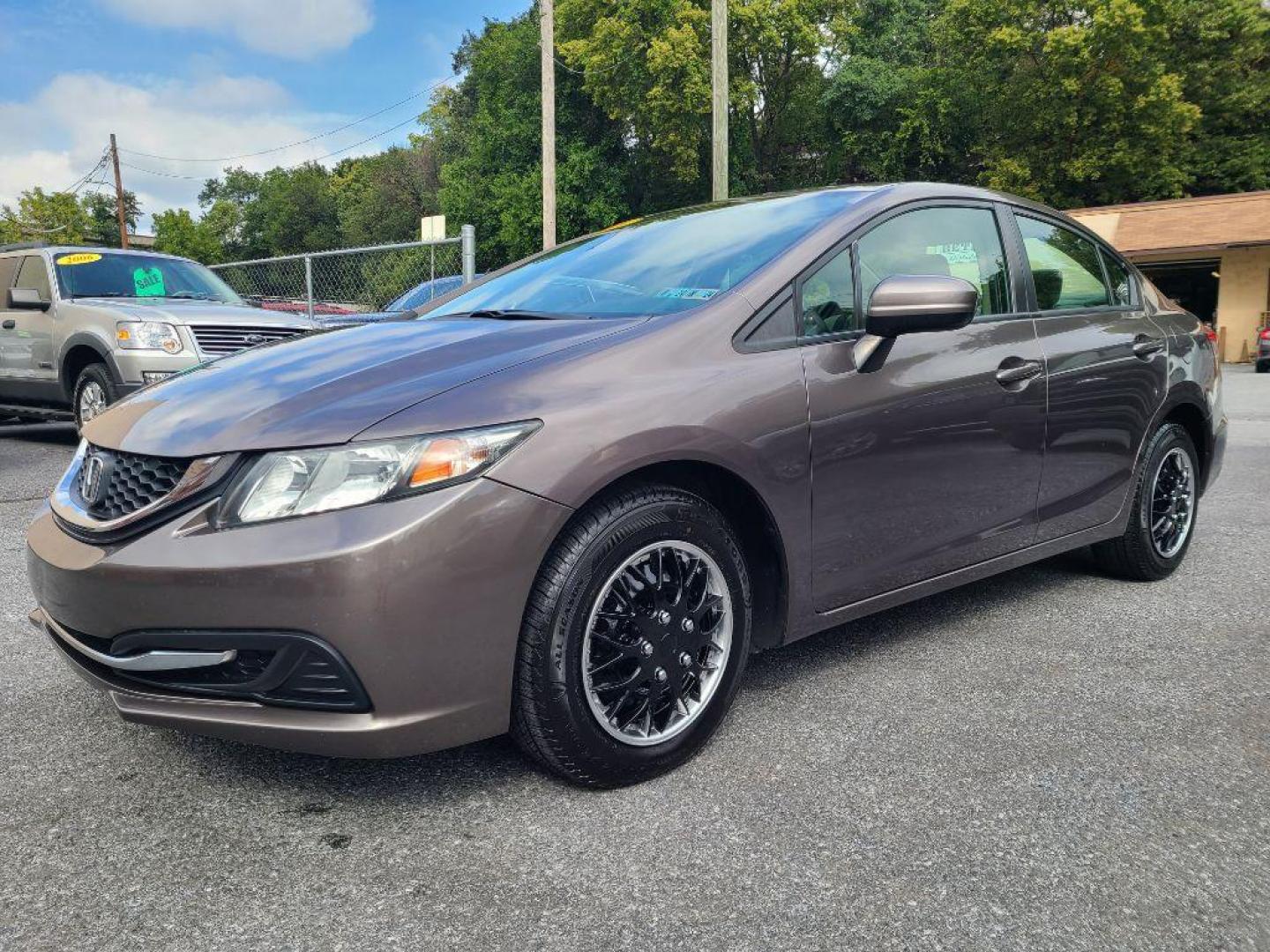 2015 BROWN HONDA CIVIC LX (19XFB2F56FE) with an 1.8L engine, Continuously Variable transmission, located at 7981 Paxton Street, Harrisburg, PA, 17111, (717) 561-2926, 40.261490, -76.749229 - Photo#0