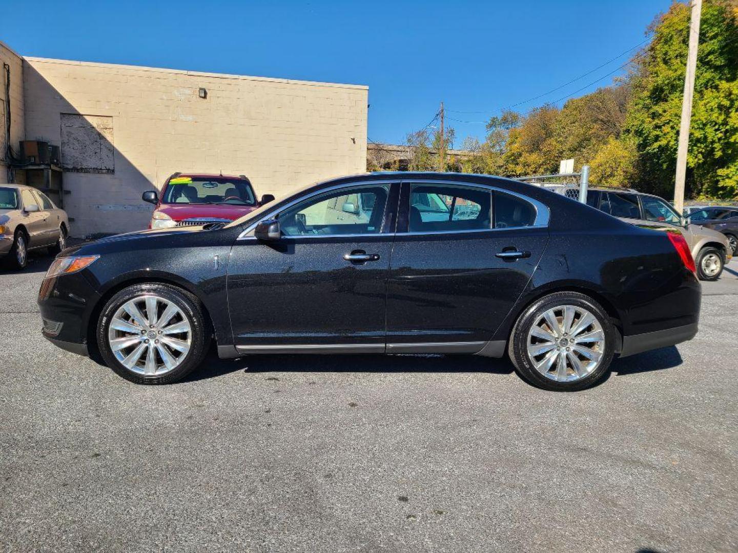 2015 BLACK LINCOLN MKS SEDAN AWD (1LNHL9FT7FG) with an 3.5L engine, Automatic transmission, located at 7981 Paxton Street, Harrisburg, PA, 17111, (717) 561-2926, 40.261490, -76.749229 - WE FINANCE!!! Good Credit/ Bad Credit/ No Credit - ALL Trade-Ins Welcomed!!! ***Guaranteed Credit Approval*** APPLY ONLINE or CALL us TODAY ;) Internet Prices and Marketplace Prices are SPECIAL discounted ***CASH DEALS*** Retail Prices are higher. Please call us to discuss your cash and finan - Photo#1