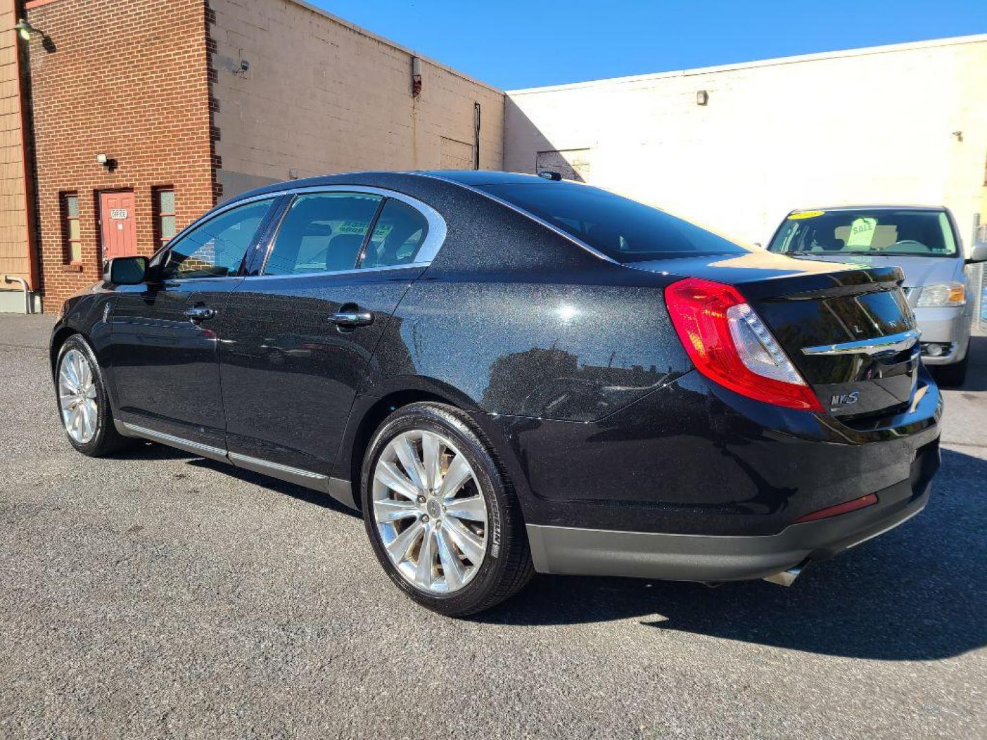 2015 BLACK LINCOLN MKS SEDAN AWD (1LNHL9FT7FG) with an 3.5L engine, Automatic transmission, located at 7981 Paxton Street, Harrisburg, PA, 17111, (717) 561-2926, 40.261490, -76.749229 - WE FINANCE!!! Good Credit/ Bad Credit/ No Credit - ALL Trade-Ins Welcomed!!! ***Guaranteed Credit Approval*** APPLY ONLINE or CALL us TODAY ;) Internet Prices and Marketplace Prices are SPECIAL discounted ***CASH DEALS*** Retail Prices are higher. Please call us to discuss your cash and finan - Photo#2