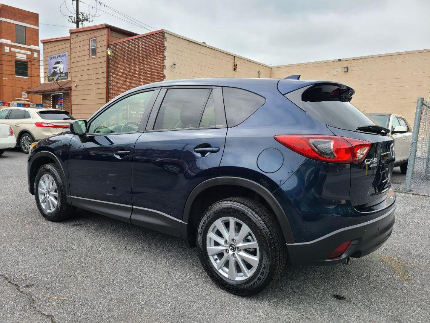 2015 BLUE MAZDA CX-5 TOURING (JM3KE4CY5F0) with an 2.5L engine, Automatic transmission, located at 117 North Cameron Street, Harrisburg, PA, 17101, (717) 963-8962, 40.267021, -76.875351 - WE FINANCE!!! Good Credit/ Bad Credit/ No Credit - ALL Trade-Ins Welcomed!!! ***Guaranteed Credit Approval*** APPLY ONLINE or CALL us TODAY ;) Internet Prices and Marketplace Prices are SPECIAL discounted ***CASH DEALS*** Retail Prices are higher. Please call us to discuss your cash and finan - Photo#2