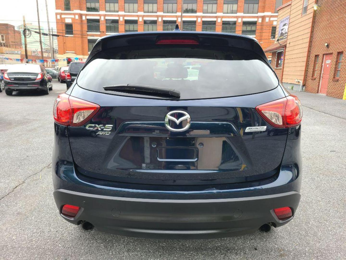 2015 BLUE MAZDA CX-5 TOURING (JM3KE4CY5F0) with an 2.5L engine, Automatic transmission, located at 117 North Cameron Street, Harrisburg, PA, 17101, (717) 963-8962, 40.267021, -76.875351 - WE FINANCE!!! Good Credit/ Bad Credit/ No Credit - ALL Trade-Ins Welcomed!!! ***Guaranteed Credit Approval*** APPLY ONLINE or CALL us TODAY ;) Internet Prices and Marketplace Prices are SPECIAL discounted ***CASH DEALS*** Retail Prices are higher. Please call us to discuss your cash and finan - Photo#3