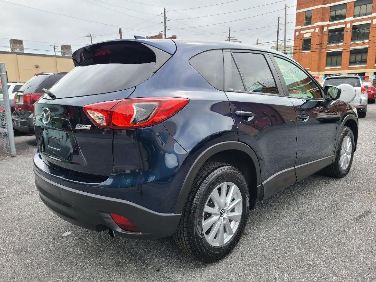 2015 BLUE MAZDA CX-5 TOURING (JM3KE4CY5F0) with an 2.5L engine, Automatic transmission, located at 117 North Cameron Street, Harrisburg, PA, 17101, (717) 963-8962, 40.267021, -76.875351 - WE FINANCE!!! Good Credit/ Bad Credit/ No Credit - ALL Trade-Ins Welcomed!!! ***Guaranteed Credit Approval*** APPLY ONLINE or CALL us TODAY ;) Internet Prices and Marketplace Prices are SPECIAL discounted ***CASH DEALS*** Retail Prices are higher. Please call us to discuss your cash and finan - Photo#4