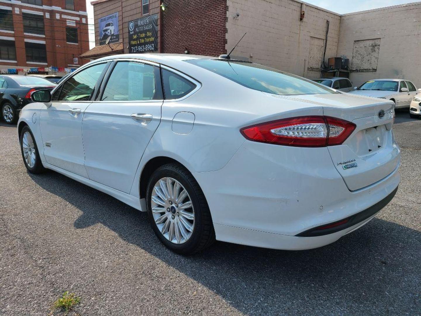 2016 WHITE FORD FUSION SE PHEV (3FA6P0PU6GR) with an 2.0L engine, Continuously Variable transmission, located at 7981 Paxton Street, Harrisburg, PA, 17111, (717) 561-2926, 40.261490, -76.749229 - WE FINANCE!!! Good Credit/ Bad Credit/ No Credit - ALL Trade-Ins Welcomed!!! ***Guaranteed Credit Approval*** APPLY ONLINE or CALL us TODAY ;) Internet Prices and Marketplace Prices are SPECIAL discounted ***CASH DEALS*** Retail Prices are higher. Please call us to discuss your cash and finan - Photo#2