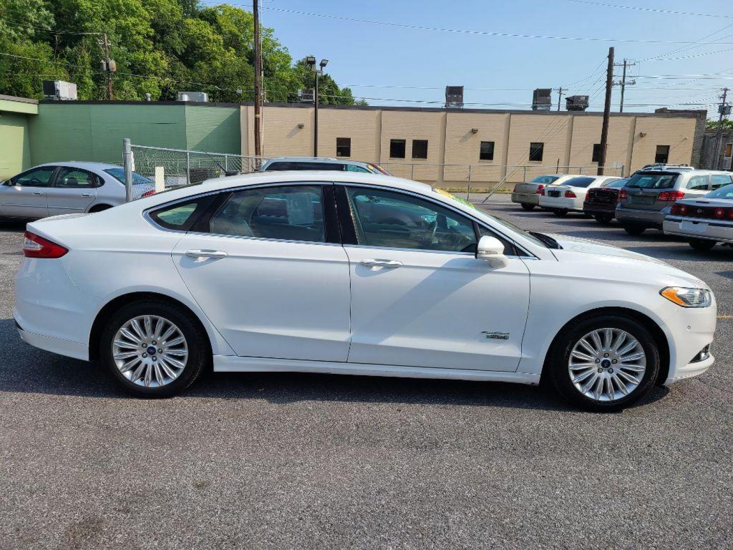 2016 WHITE FORD FUSION SE PHEV (3FA6P0PU6GR) with an 2.0L engine, Continuously Variable transmission, located at 7981 Paxton Street, Harrisburg, PA, 17111, (717) 561-2926, 40.261490, -76.749229 - WE FINANCE!!! Good Credit/ Bad Credit/ No Credit - ALL Trade-Ins Welcomed!!! ***Guaranteed Credit Approval*** APPLY ONLINE or CALL us TODAY ;) Internet Prices and Marketplace Prices are SPECIAL discounted ***CASH DEALS*** Retail Prices are higher. Please call us to discuss your cash and finan - Photo#5