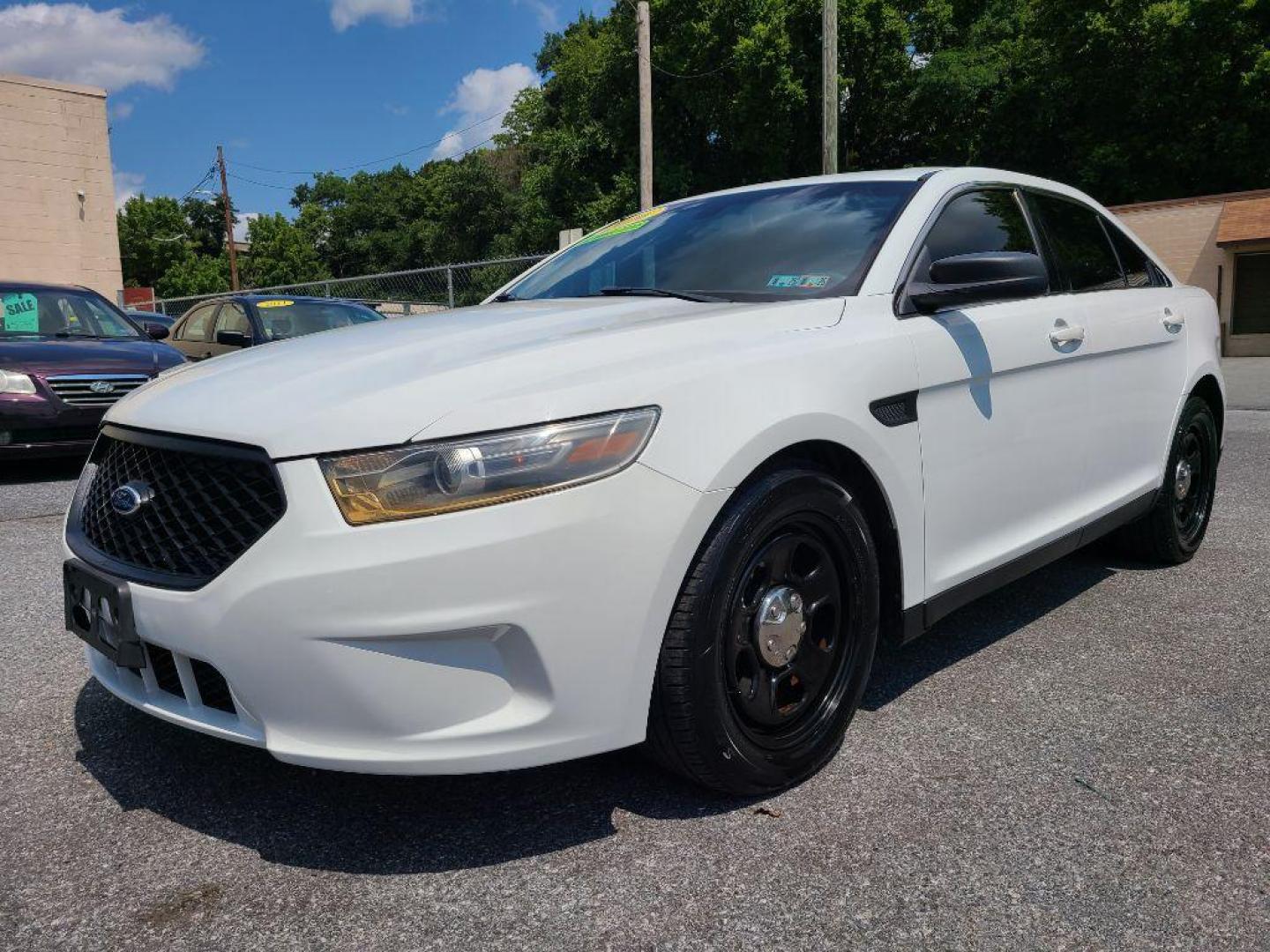 2016 WHITE FORD TAURUS POLICE INTERCEPTOR (1FAHP2MK4GG) with an 3.7L engine, Automatic transmission, located at 117 North Cameron Street, Harrisburg, PA, 17101, (717) 963-8962, 40.267021, -76.875351 - WE FINANCE!!! Good Credit/ Bad Credit/ No Credit - ALL Trade-Ins Welcomed!!! ***Guaranteed Credit Approval*** APPLY ONLINE or CALL us TODAY ;) Internet Prices and Marketplace Prices are SPECIAL discounted ***CASH DEALS*** Retail Prices are higher. Please call us to discuss your cash and finan - Photo#0