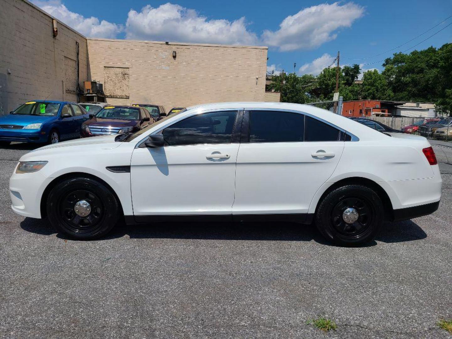 2016 WHITE FORD TAURUS POLICE INTERCEPTOR (1FAHP2MK4GG) with an 3.7L engine, Automatic transmission, located at 117 North Cameron Street, Harrisburg, PA, 17101, (717) 963-8962, 40.267021, -76.875351 - WE FINANCE!!! Good Credit/ Bad Credit/ No Credit - ALL Trade-Ins Welcomed!!! ***Guaranteed Credit Approval*** APPLY ONLINE or CALL us TODAY ;) Internet Prices and Marketplace Prices are SPECIAL discounted ***CASH DEALS*** Retail Prices are higher. Please call us to discuss your cash and finan - Photo#1