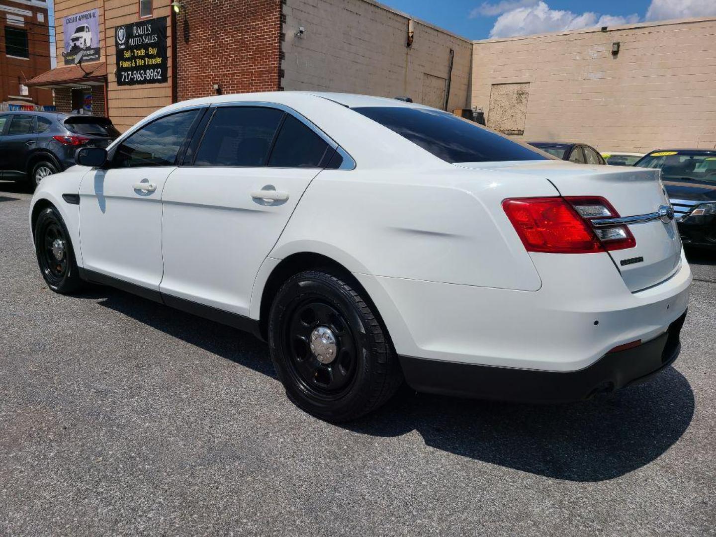 2016 WHITE FORD TAURUS POLICE INTERCEPTOR (1FAHP2MK4GG) with an 3.7L engine, Automatic transmission, located at 117 North Cameron Street, Harrisburg, PA, 17101, (717) 963-8962, 40.267021, -76.875351 - WE FINANCE!!! Good Credit/ Bad Credit/ No Credit - ALL Trade-Ins Welcomed!!! ***Guaranteed Credit Approval*** APPLY ONLINE or CALL us TODAY ;) Internet Prices and Marketplace Prices are SPECIAL discounted ***CASH DEALS*** Retail Prices are higher. Please call us to discuss your cash and finan - Photo#2