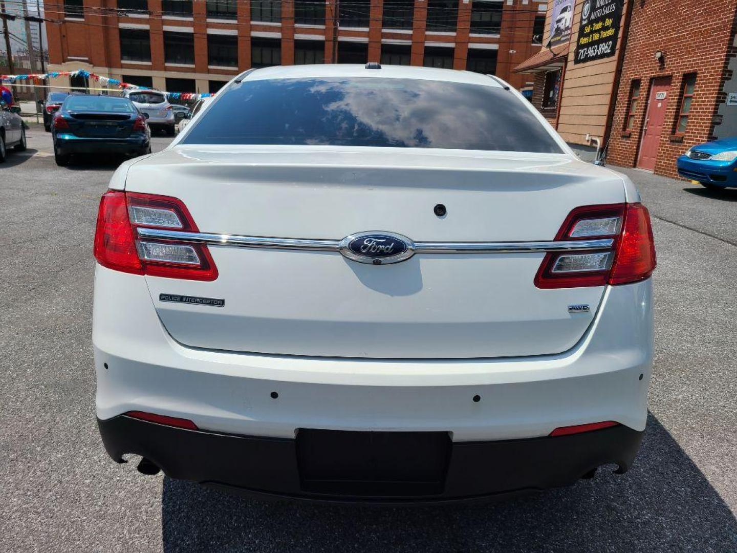 2016 WHITE FORD TAURUS POLICE INTERCEPTOR (1FAHP2MK4GG) with an 3.7L engine, Automatic transmission, located at 117 North Cameron Street, Harrisburg, PA, 17101, (717) 963-8962, 40.267021, -76.875351 - WE FINANCE!!! Good Credit/ Bad Credit/ No Credit - ALL Trade-Ins Welcomed!!! ***Guaranteed Credit Approval*** APPLY ONLINE or CALL us TODAY ;) Internet Prices and Marketplace Prices are SPECIAL discounted ***CASH DEALS*** Retail Prices are higher. Please call us to discuss your cash and finan - Photo#3