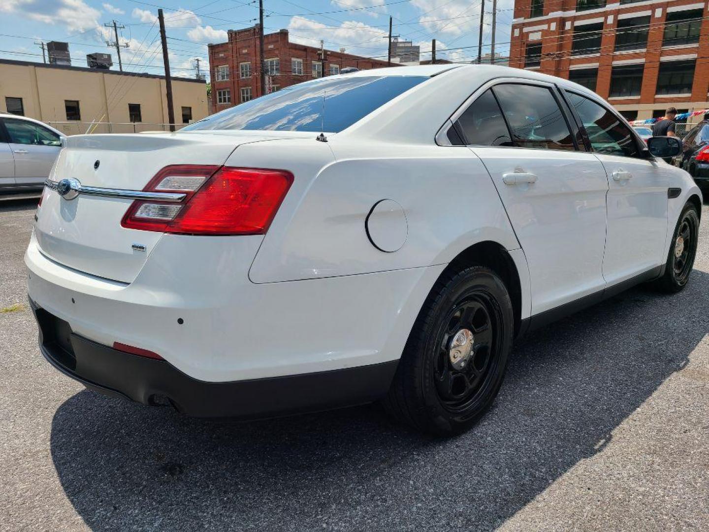 2016 WHITE FORD TAURUS POLICE INTERCEPTOR (1FAHP2MK4GG) with an 3.7L engine, Automatic transmission, located at 117 North Cameron Street, Harrisburg, PA, 17101, (717) 963-8962, 40.267021, -76.875351 - WE FINANCE!!! Good Credit/ Bad Credit/ No Credit - ALL Trade-Ins Welcomed!!! ***Guaranteed Credit Approval*** APPLY ONLINE or CALL us TODAY ;) Internet Prices and Marketplace Prices are SPECIAL discounted ***CASH DEALS*** Retail Prices are higher. Please call us to discuss your cash and finan - Photo#4