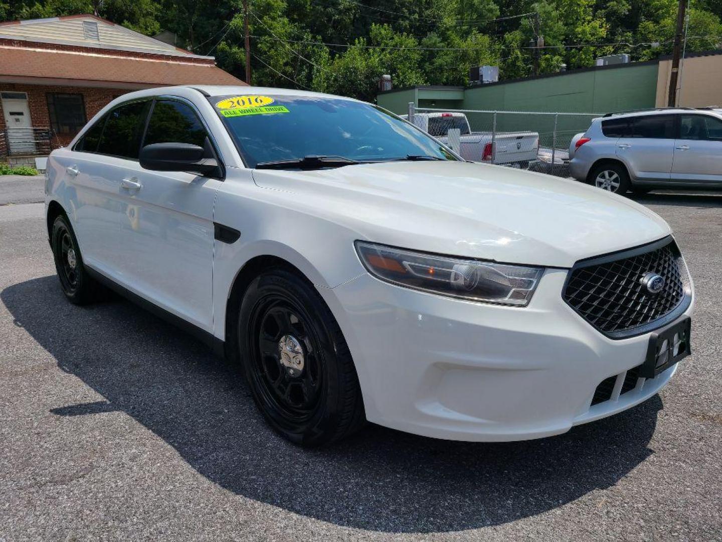 2016 WHITE FORD TAURUS POLICE INTERCEPTOR (1FAHP2MK4GG) with an 3.7L engine, Automatic transmission, located at 117 North Cameron Street, Harrisburg, PA, 17101, (717) 963-8962, 40.267021, -76.875351 - WE FINANCE!!! Good Credit/ Bad Credit/ No Credit - ALL Trade-Ins Welcomed!!! ***Guaranteed Credit Approval*** APPLY ONLINE or CALL us TODAY ;) Internet Prices and Marketplace Prices are SPECIAL discounted ***CASH DEALS*** Retail Prices are higher. Please call us to discuss your cash and finan - Photo#6