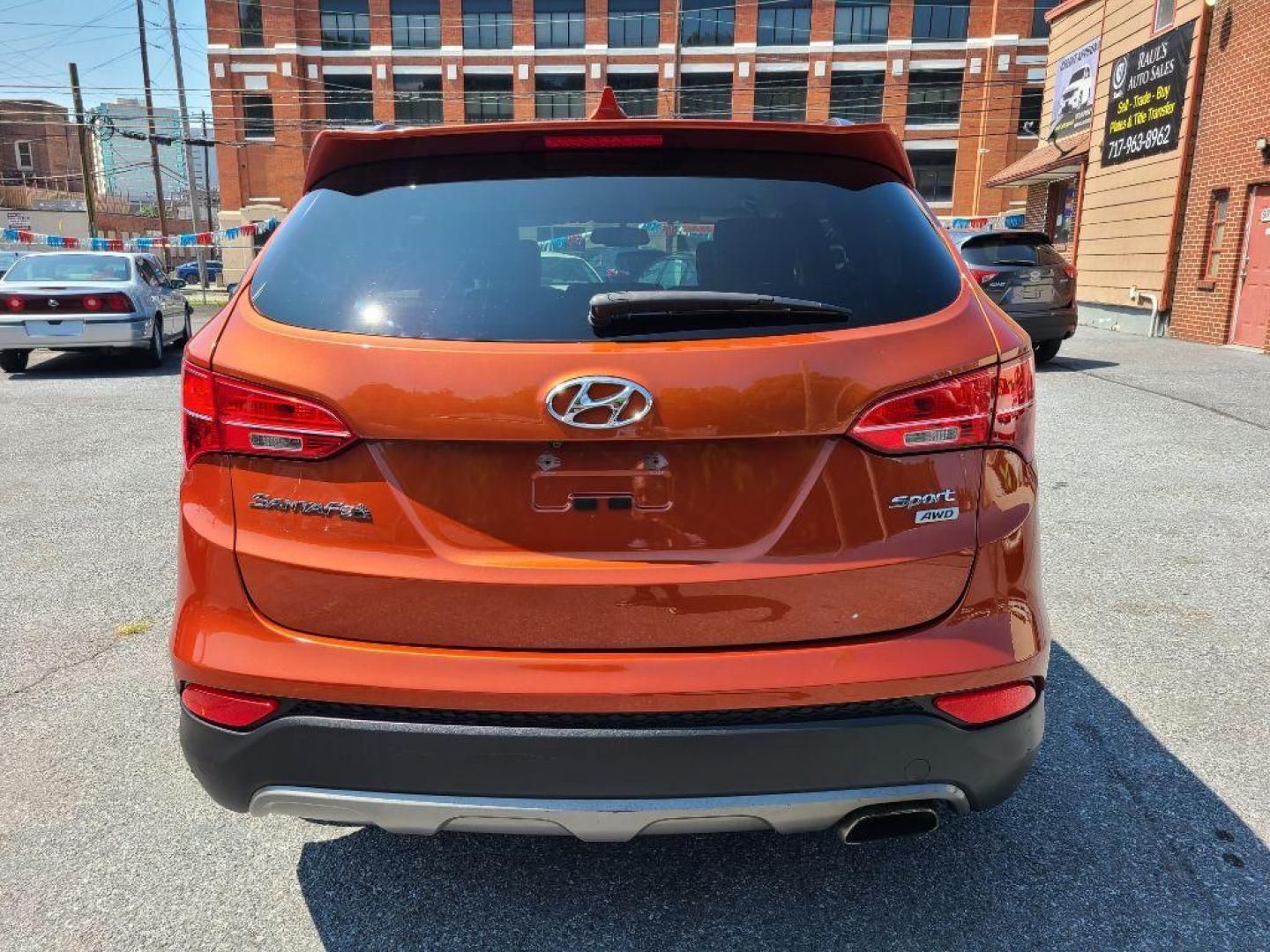 2016 ORANGE HYUNDAI SANTA FE SPORT AWD (5XYZUDLB3GG) with an 2.4L engine, Automatic transmission, located at 7981 Paxton Street, Harrisburg, PA, 17111, (717) 561-2926, 40.261490, -76.749229 - WE FINANCE!!! Good Credit/ Bad Credit/ No Credit - ALL Trade-Ins Welcomed!!! ***Guaranteed Credit Approval*** APPLY ONLINE or CALL us TODAY ;) Internet Prices and Marketplace Prices are SPECIAL discounted ***CASH DEALS*** Retail Prices are higher. Please call us to discuss your cash and finan - Photo#3