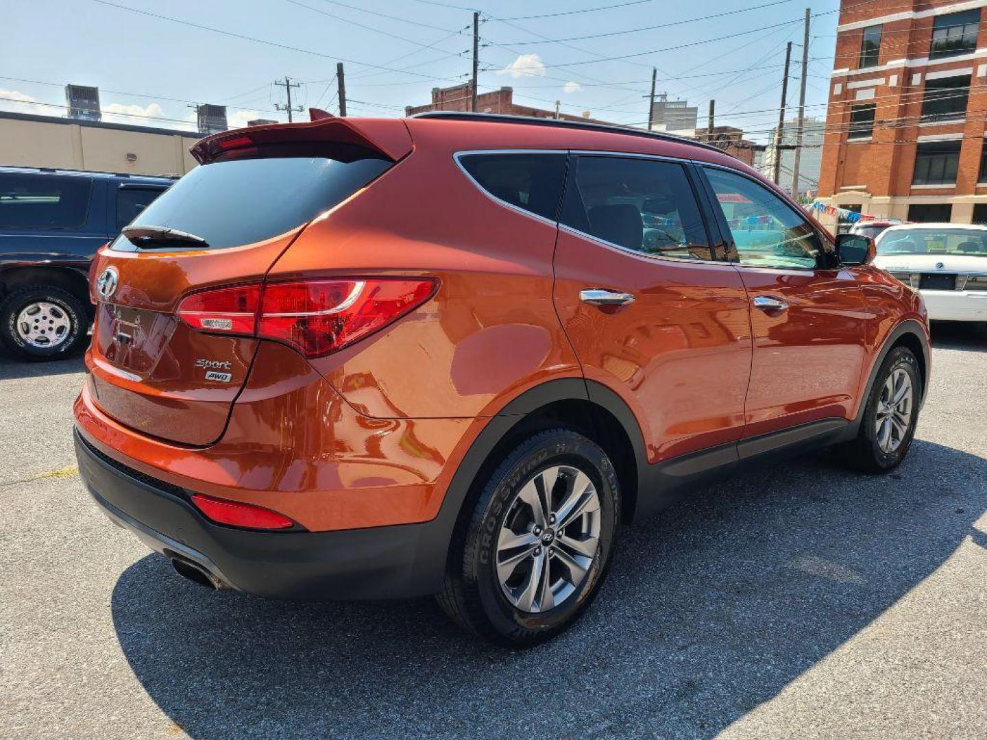 2016 ORANGE HYUNDAI SANTA FE SPORT AWD (5XYZUDLB3GG) with an 2.4L engine, Automatic transmission, located at 7981 Paxton Street, Harrisburg, PA, 17111, (717) 561-2926, 40.261490, -76.749229 - WE FINANCE!!! Good Credit/ Bad Credit/ No Credit - ALL Trade-Ins Welcomed!!! ***Guaranteed Credit Approval*** APPLY ONLINE or CALL us TODAY ;) Internet Prices and Marketplace Prices are SPECIAL discounted ***CASH DEALS*** Retail Prices are higher. Please call us to discuss your cash and finan - Photo#4